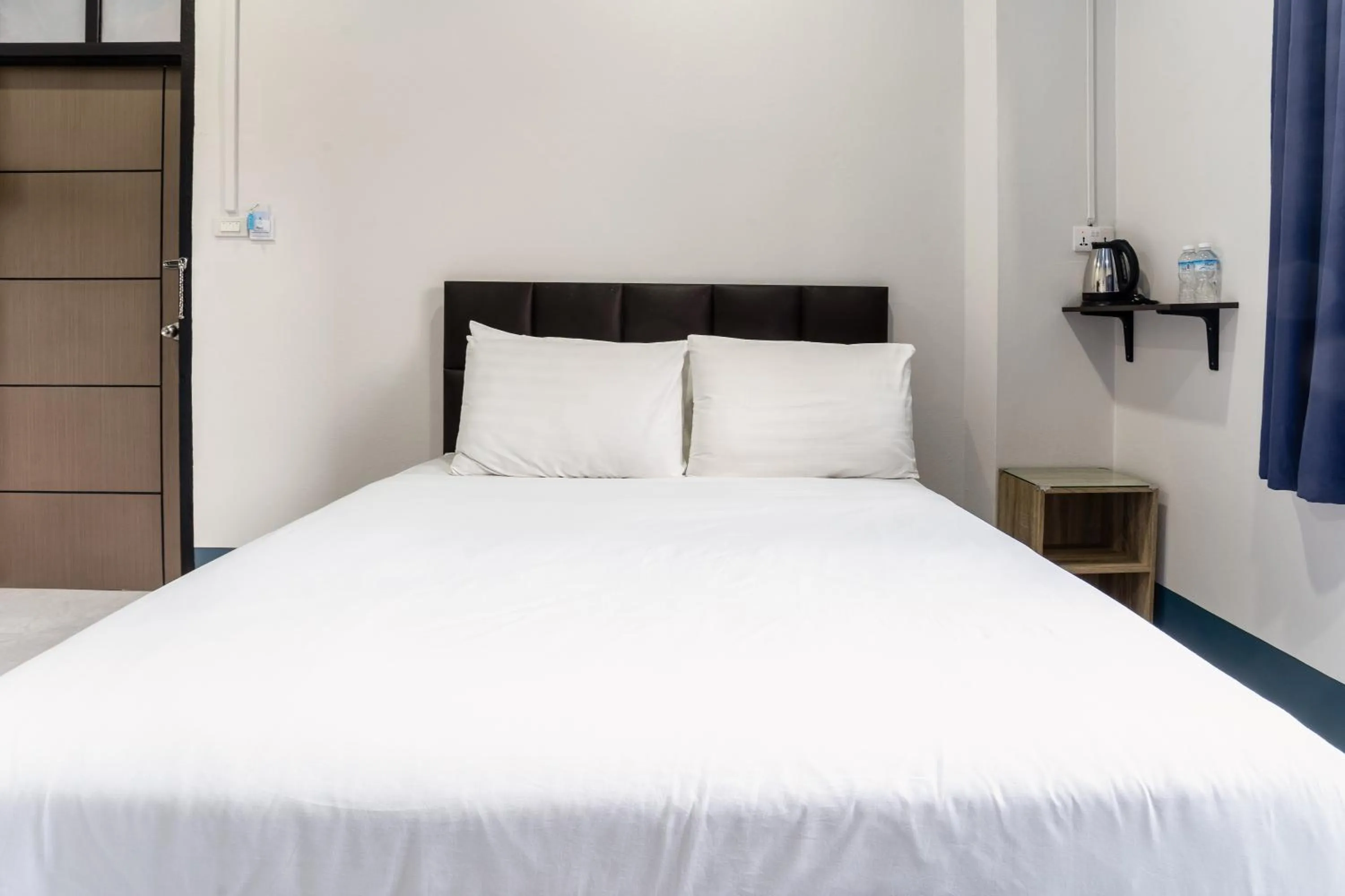 Bed in Udomsuk Hotel