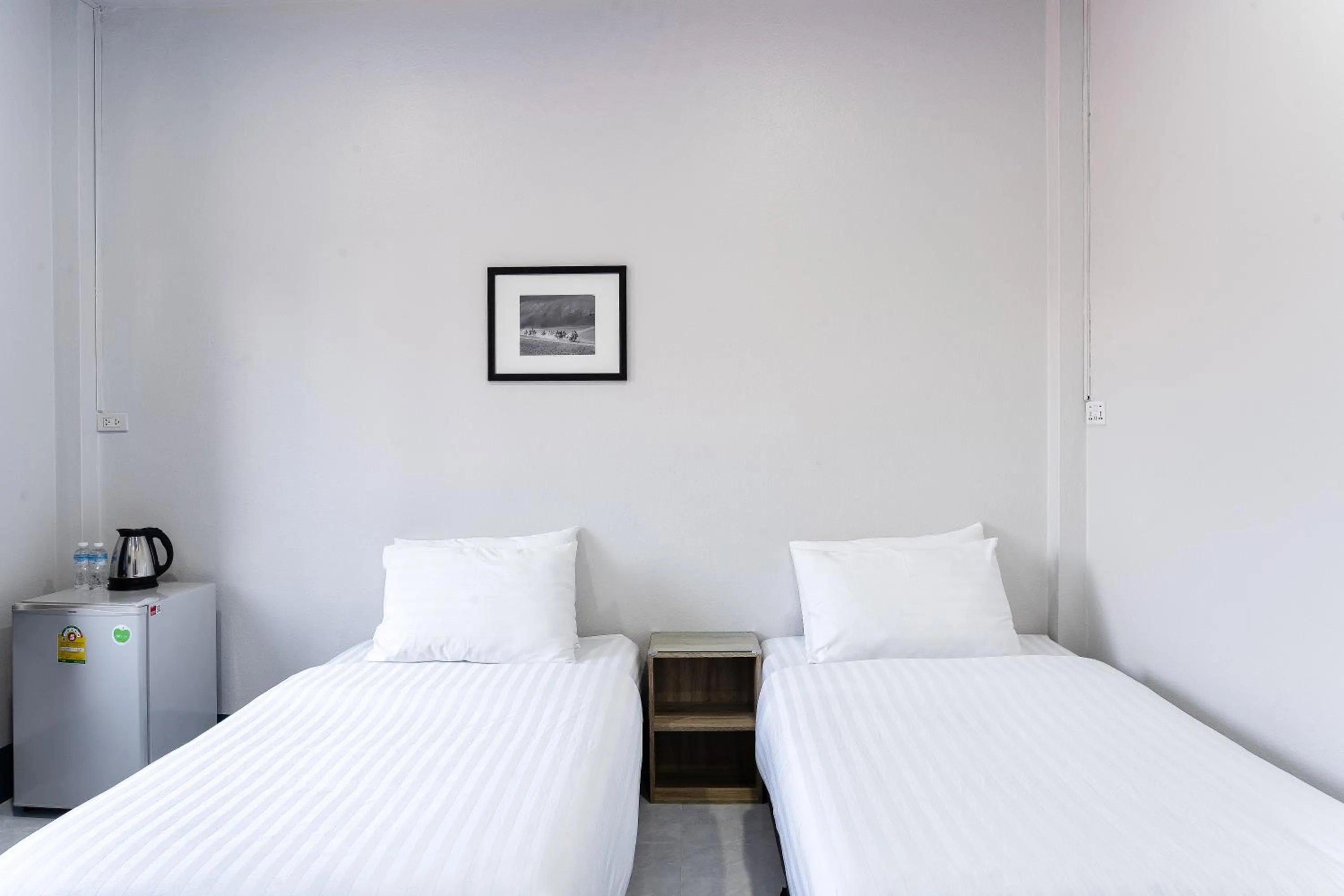 Bed in Udomsuk Hotel