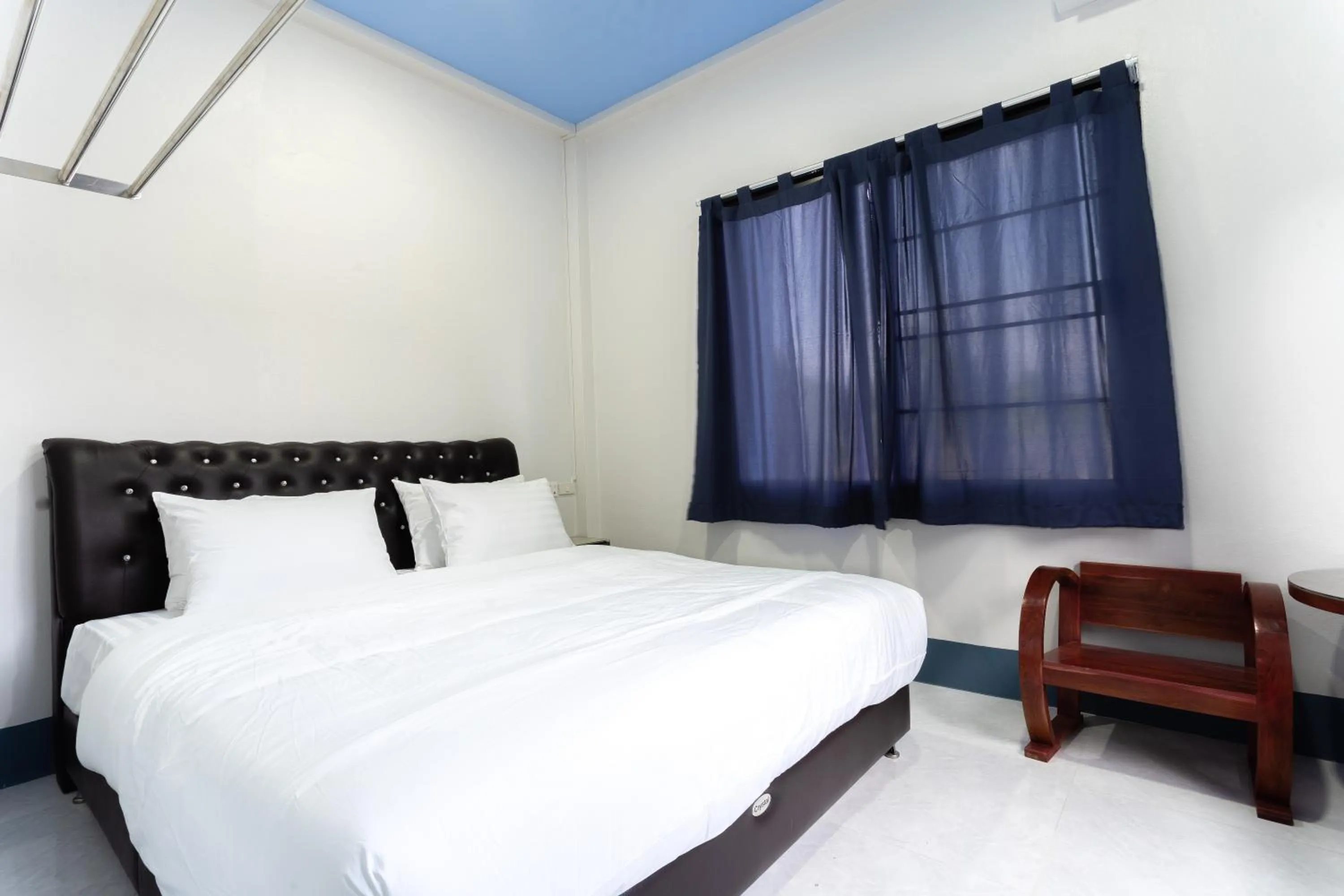 Bed in Udomsuk Hotel