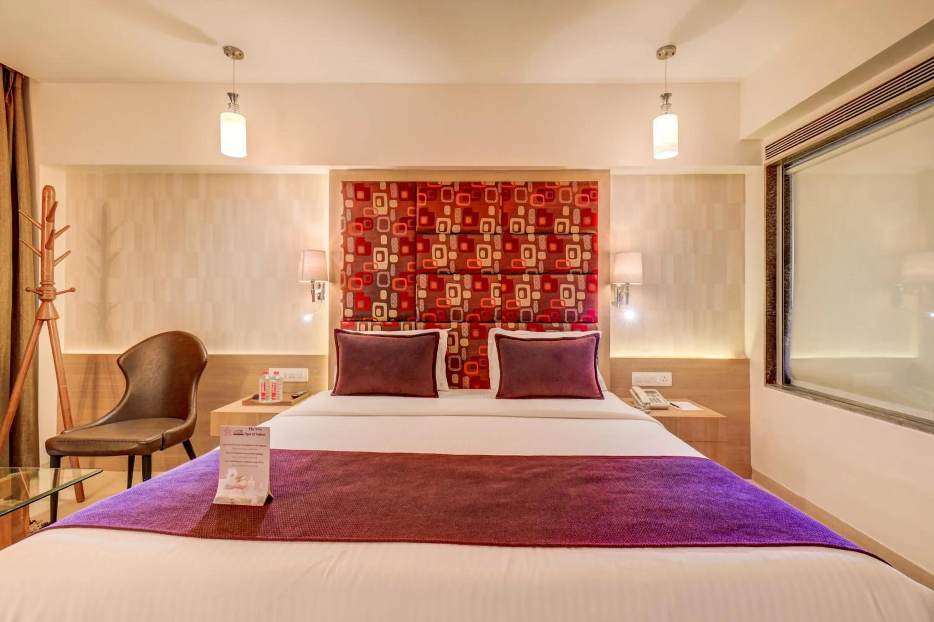 Bedroom, Bed in The SSK Solitaire Hotel & Banquets