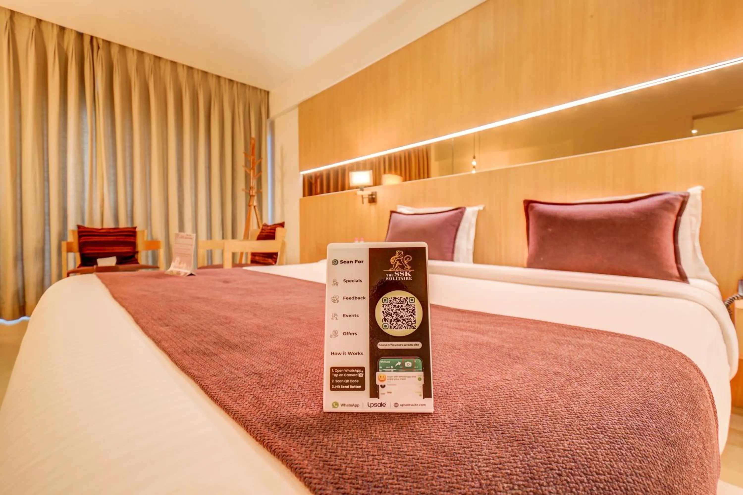 Bed in The SSK Solitaire Hotel & Banquets