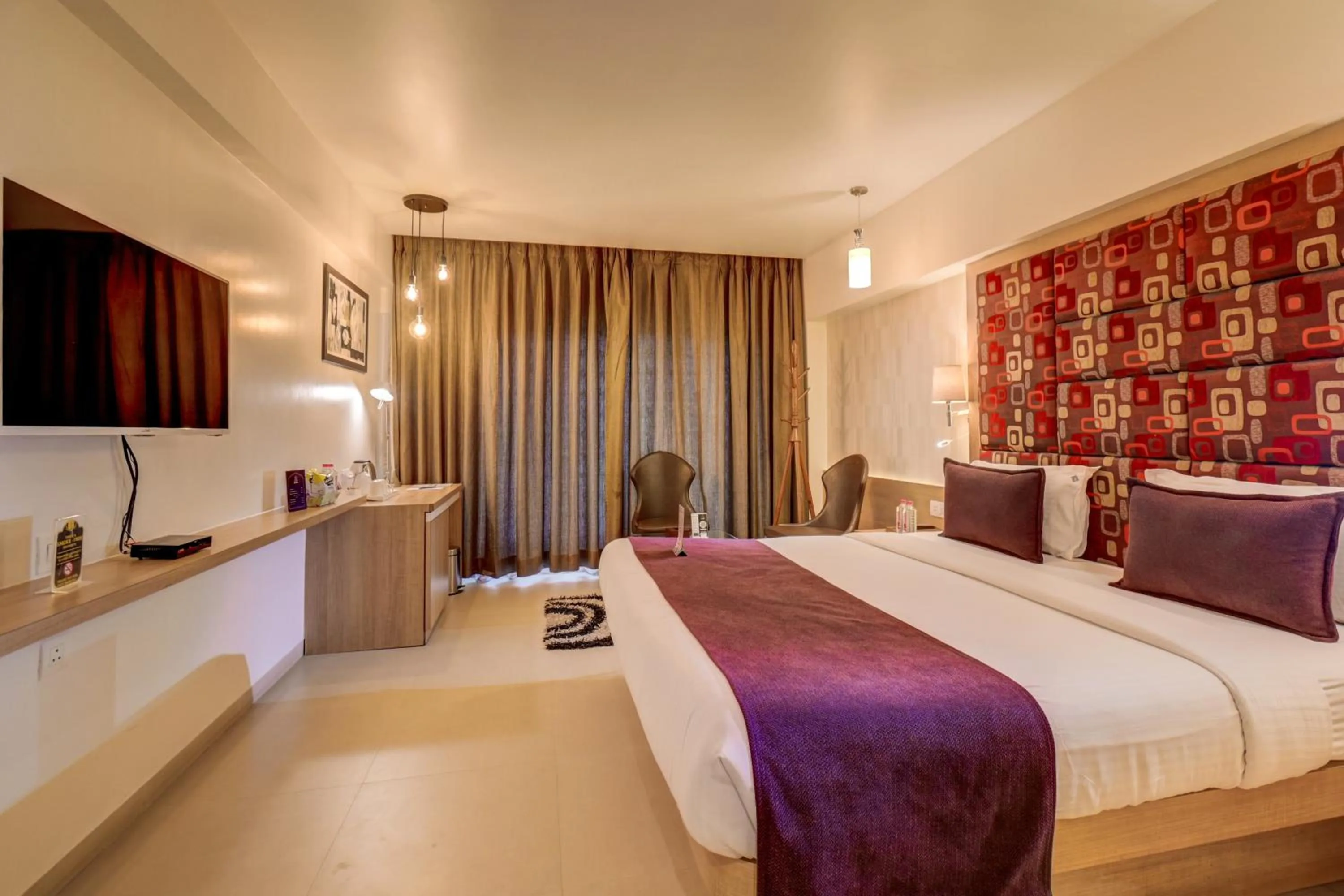 Bedroom, Bed in The SSK Solitaire Hotel & Banquets