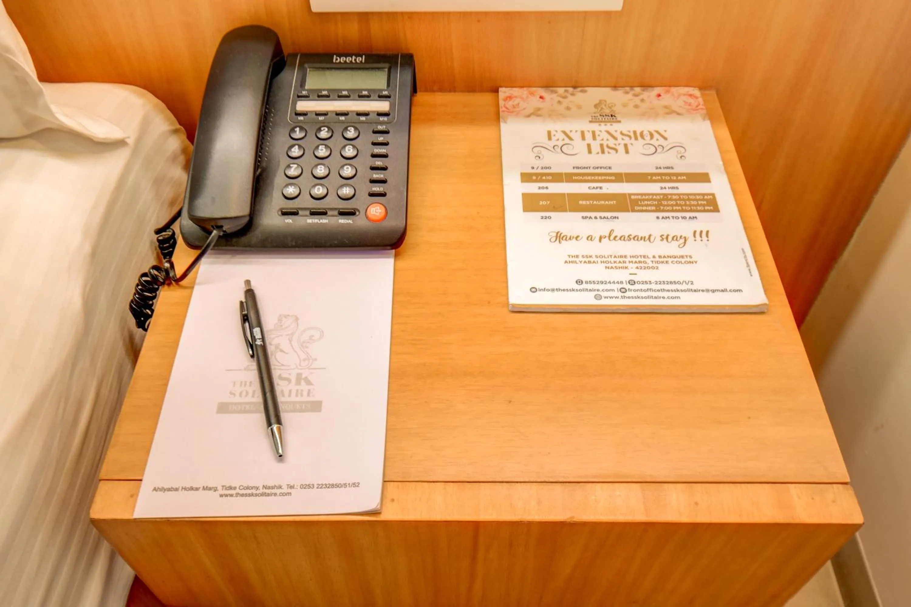 Text overlay in The SSK Solitaire Hotel & Banquets