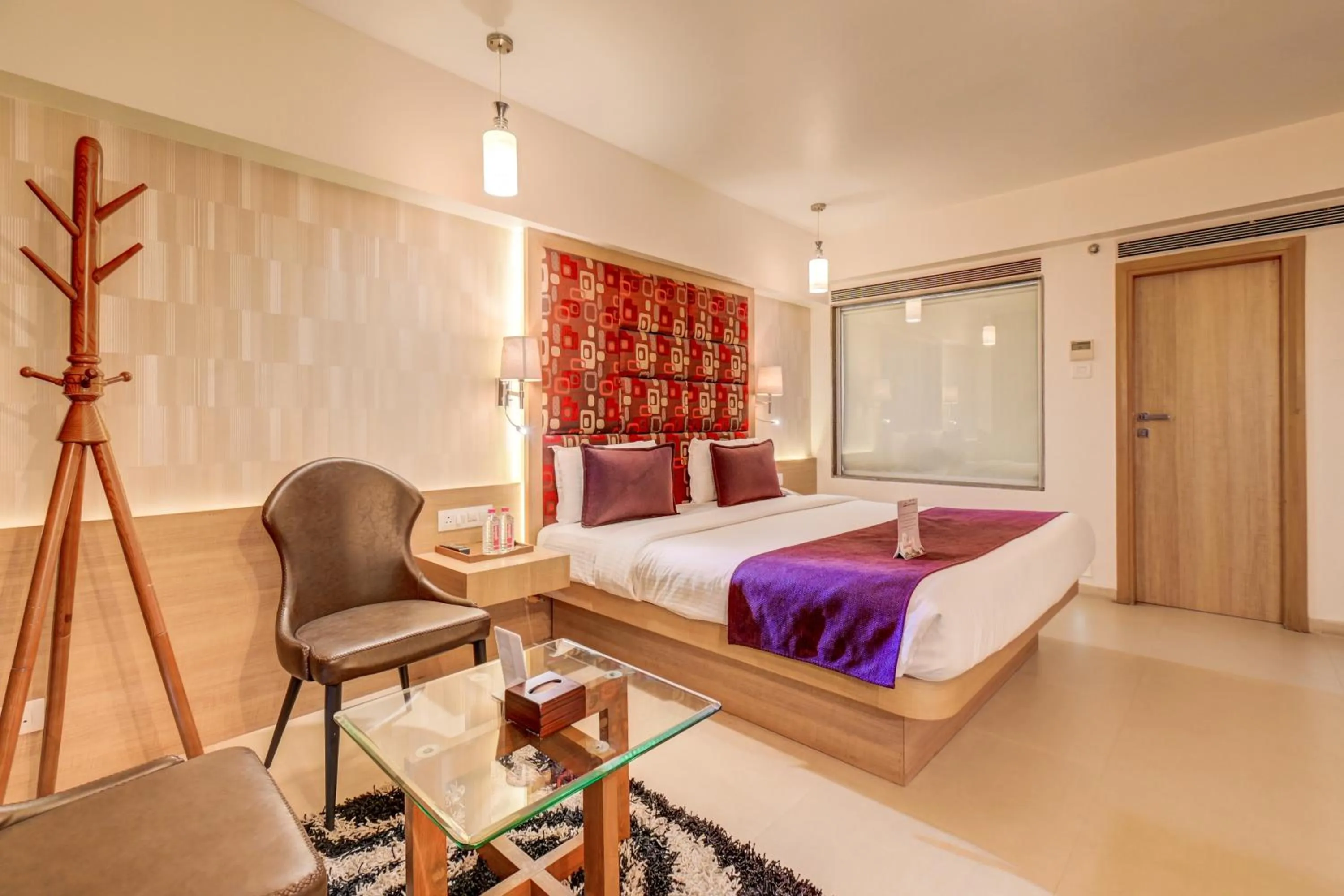 Bedroom, Bed in The SSK Solitaire Hotel & Banquets