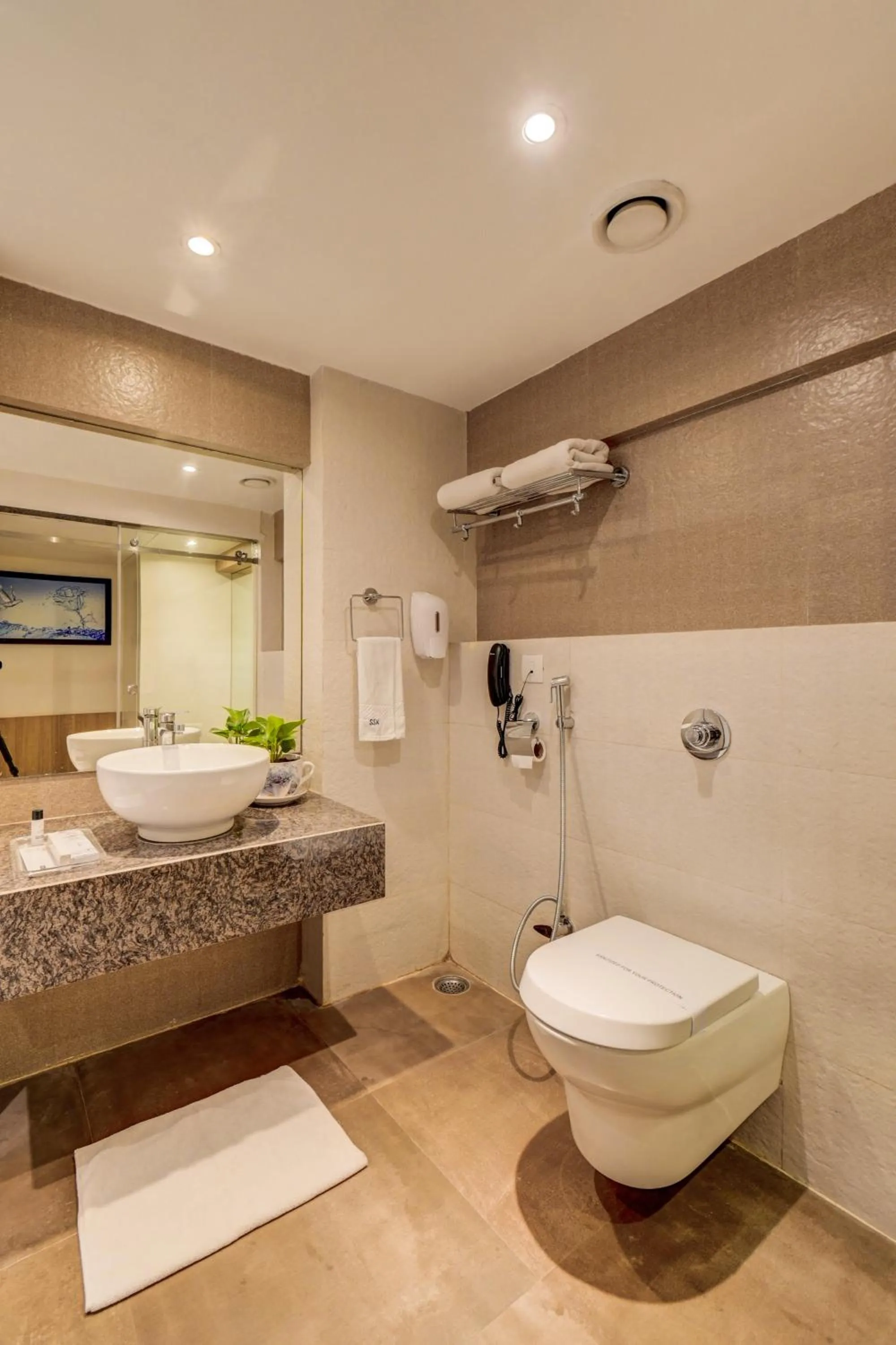 Toilet in The SSK Solitaire Hotel & Banquets