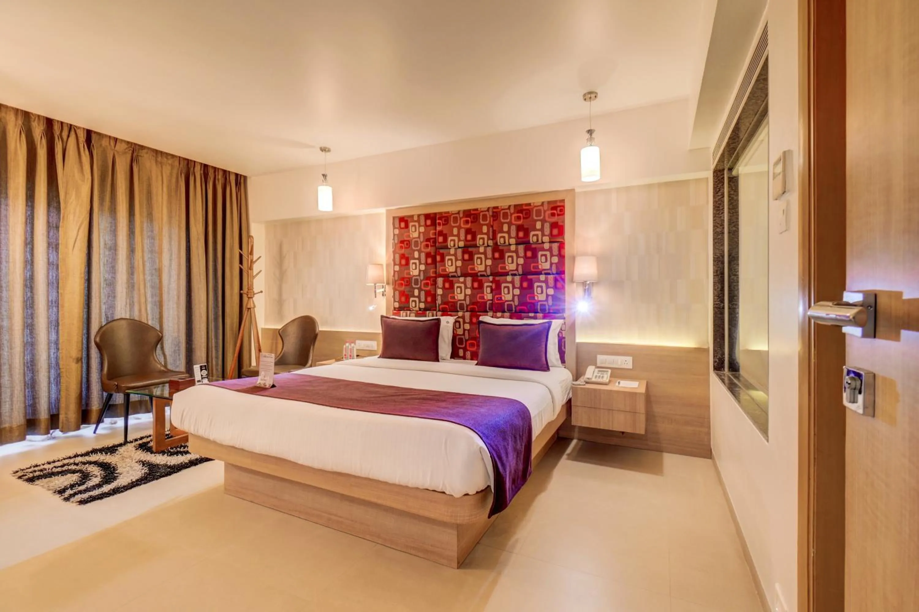 Bedroom, Bed in The SSK Solitaire Hotel & Banquets