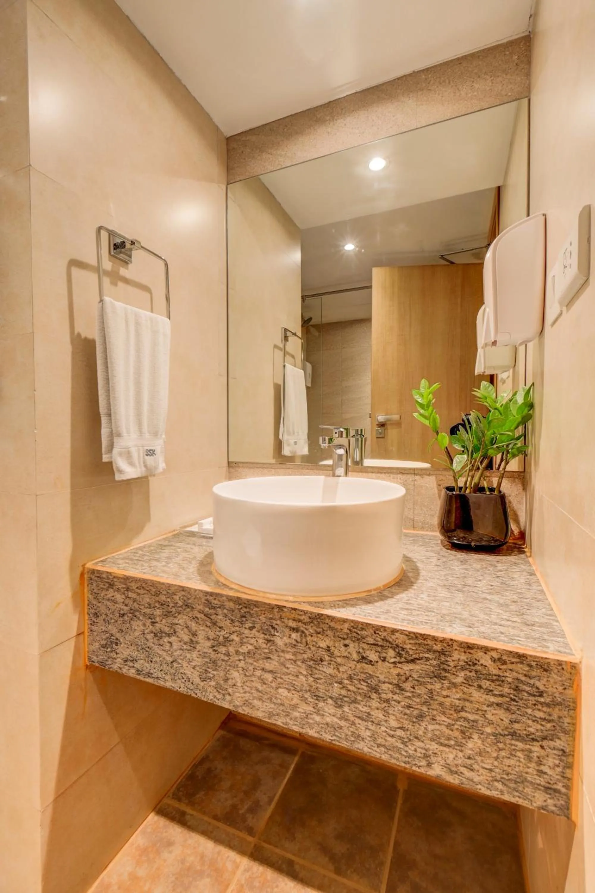 towels in The SSK Solitaire Hotel & Banquets