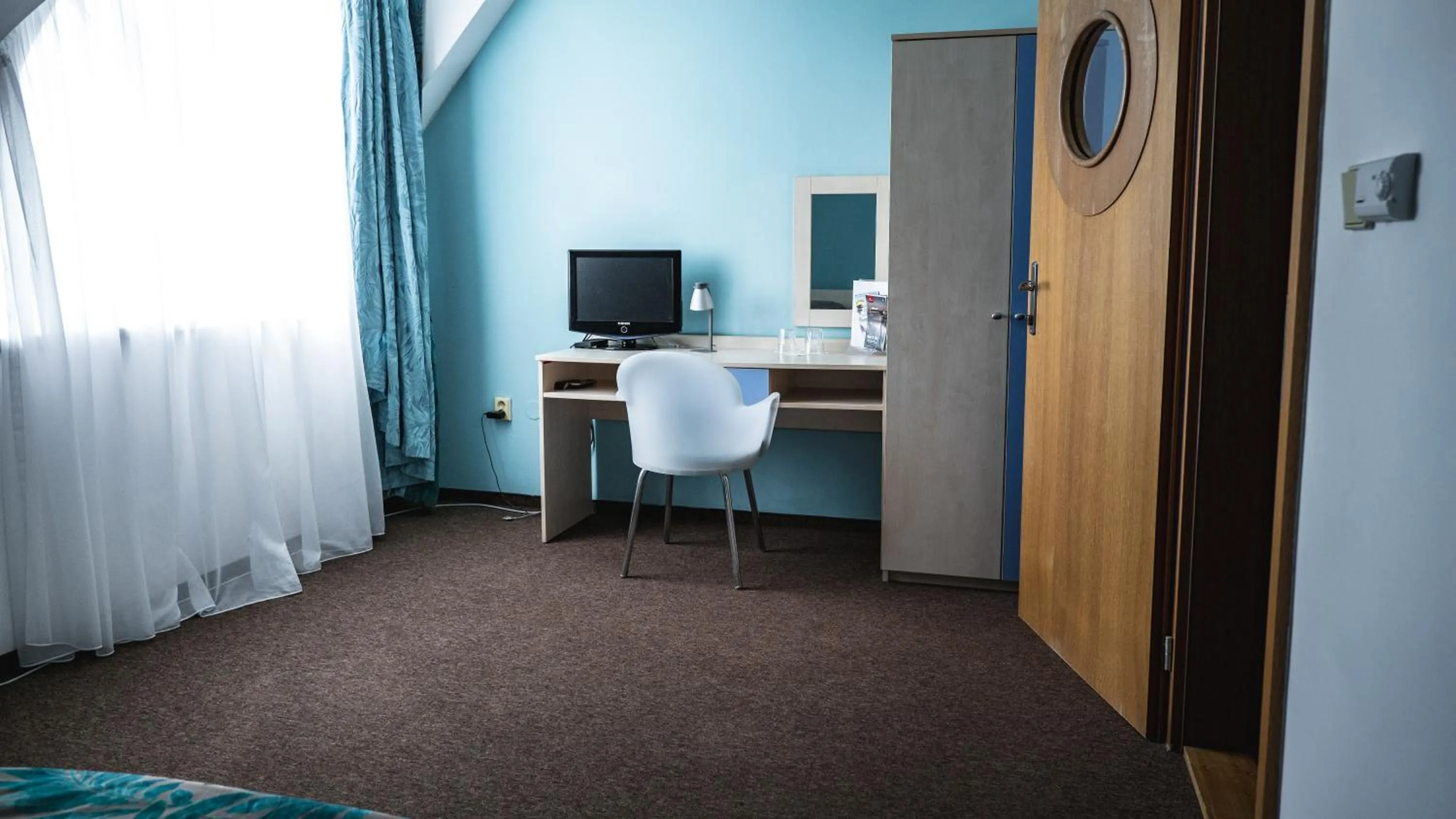 Photo of the whole room, Bed in Hotel and Park Divoká Voda