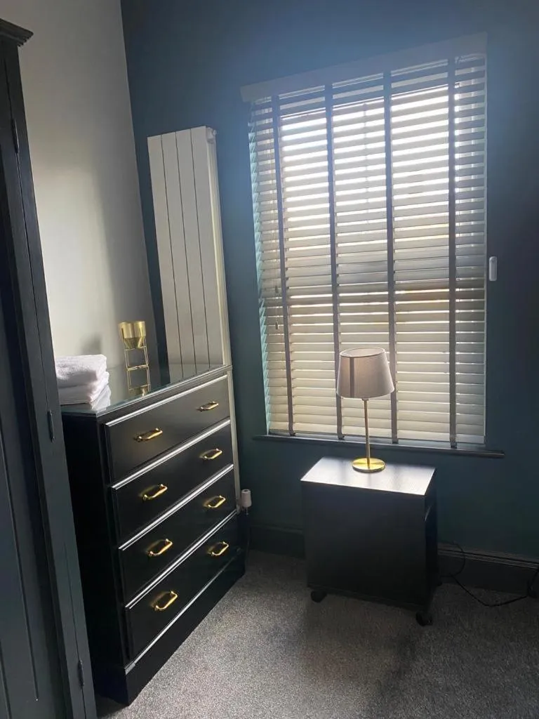 Bed in Raby Apartment