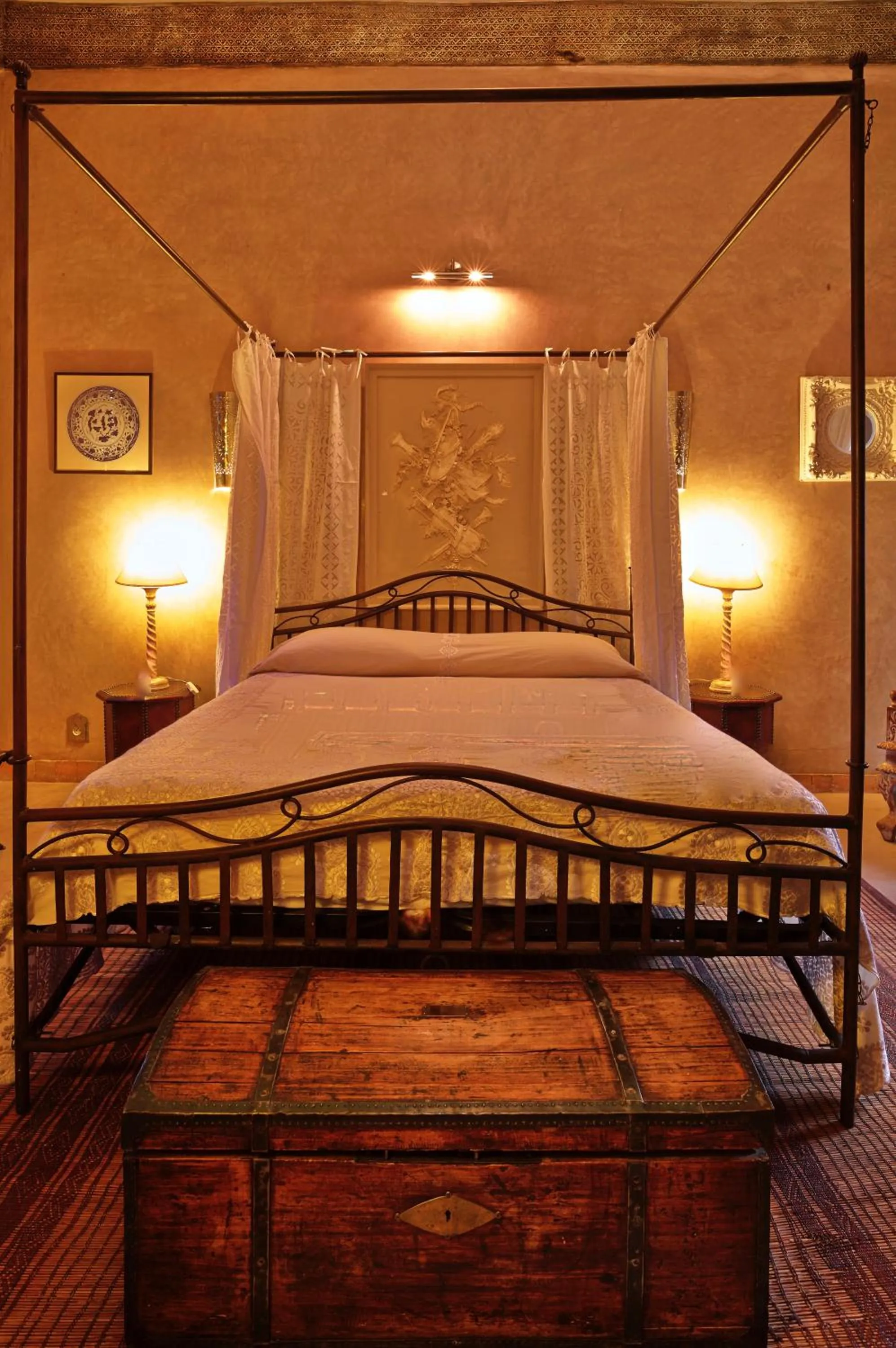 Bed in Riad Noir d'Ivoire