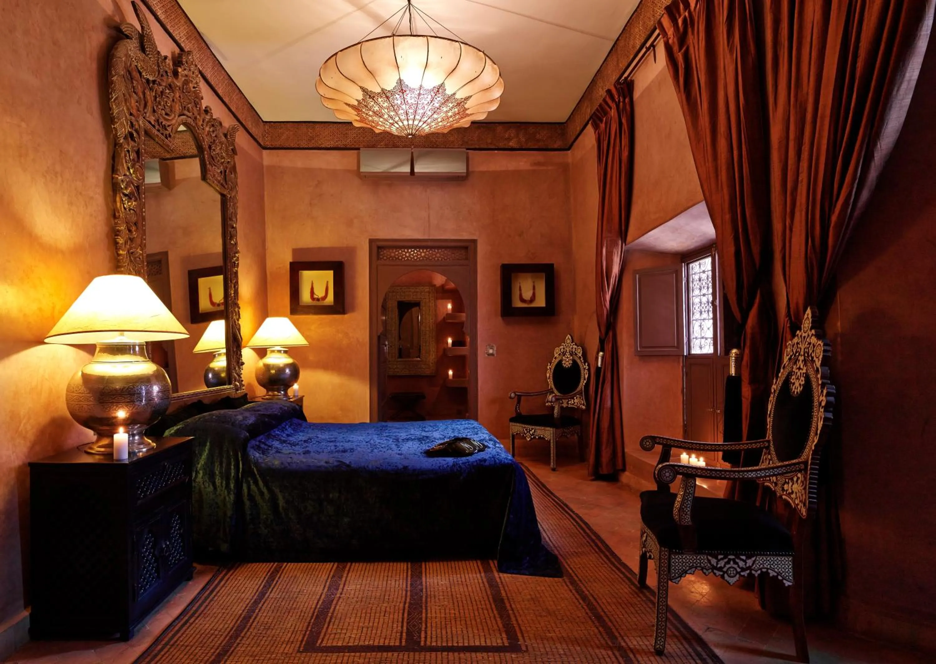 Bed in Riad Noir d'Ivoire