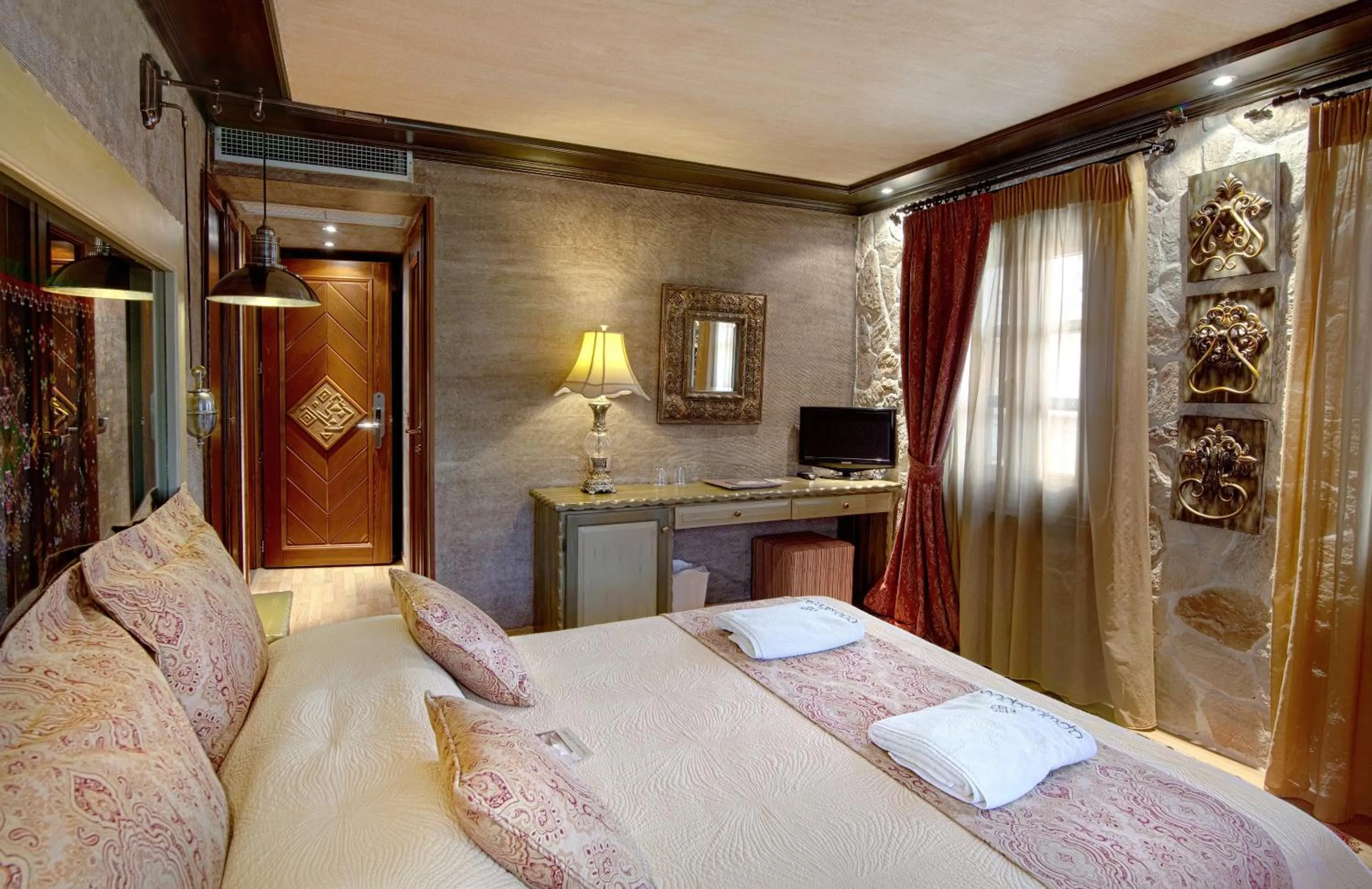 Bed in AROMA DRYOS SPA & ECO Hotel