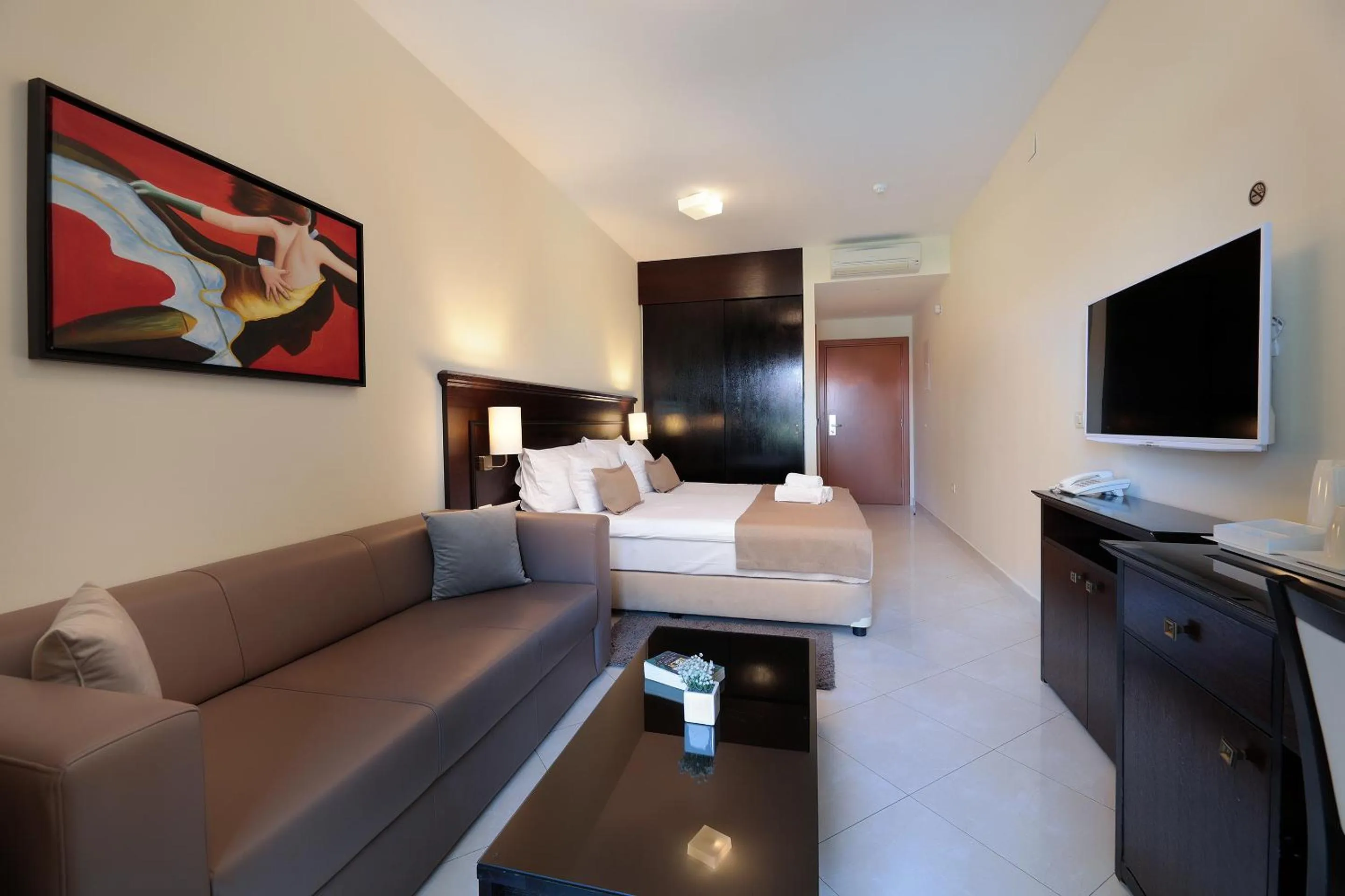 Seating area, Bed in Blue Waves Resort