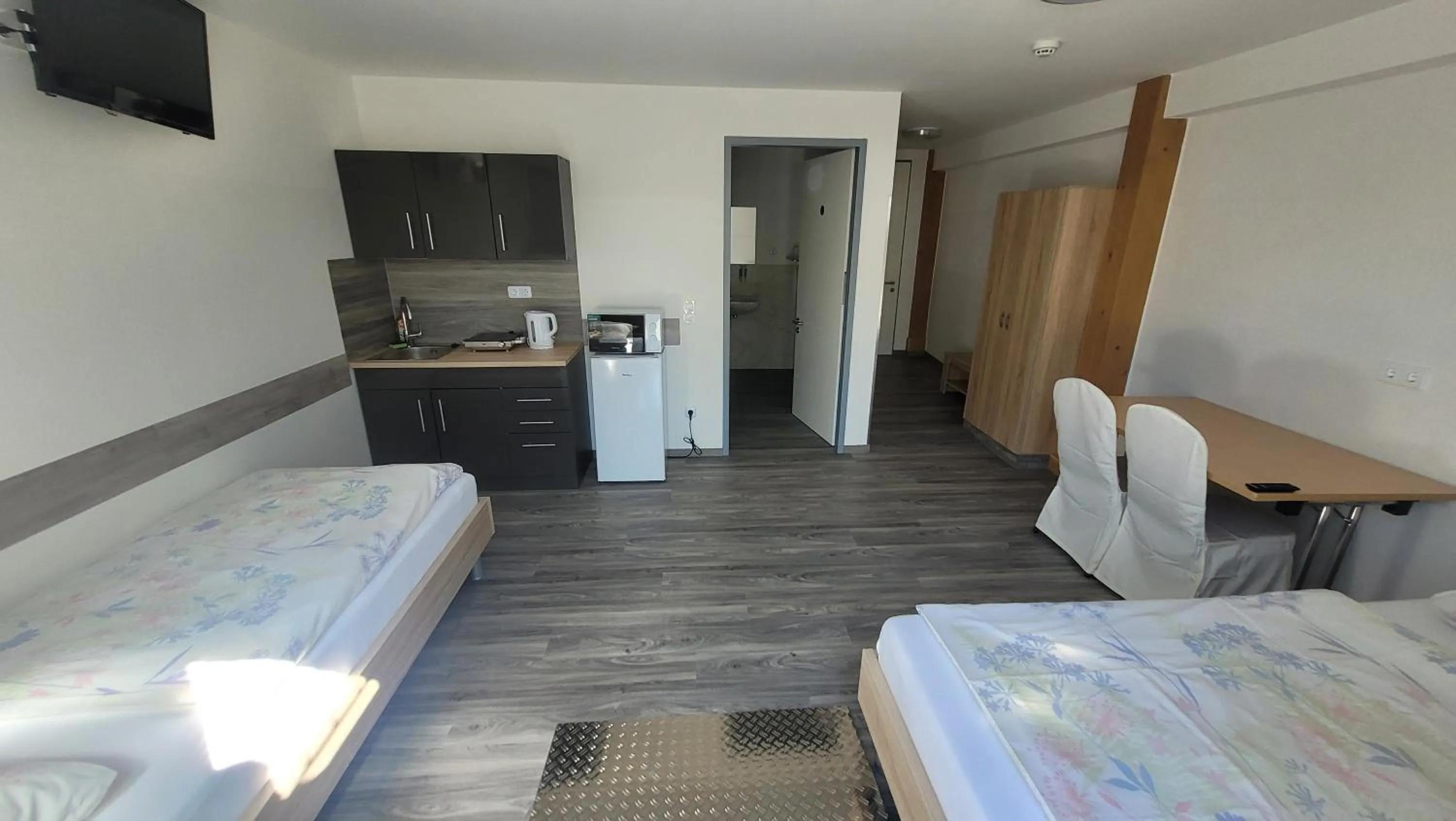 Bed in Drei Bären Hotel & Apartments