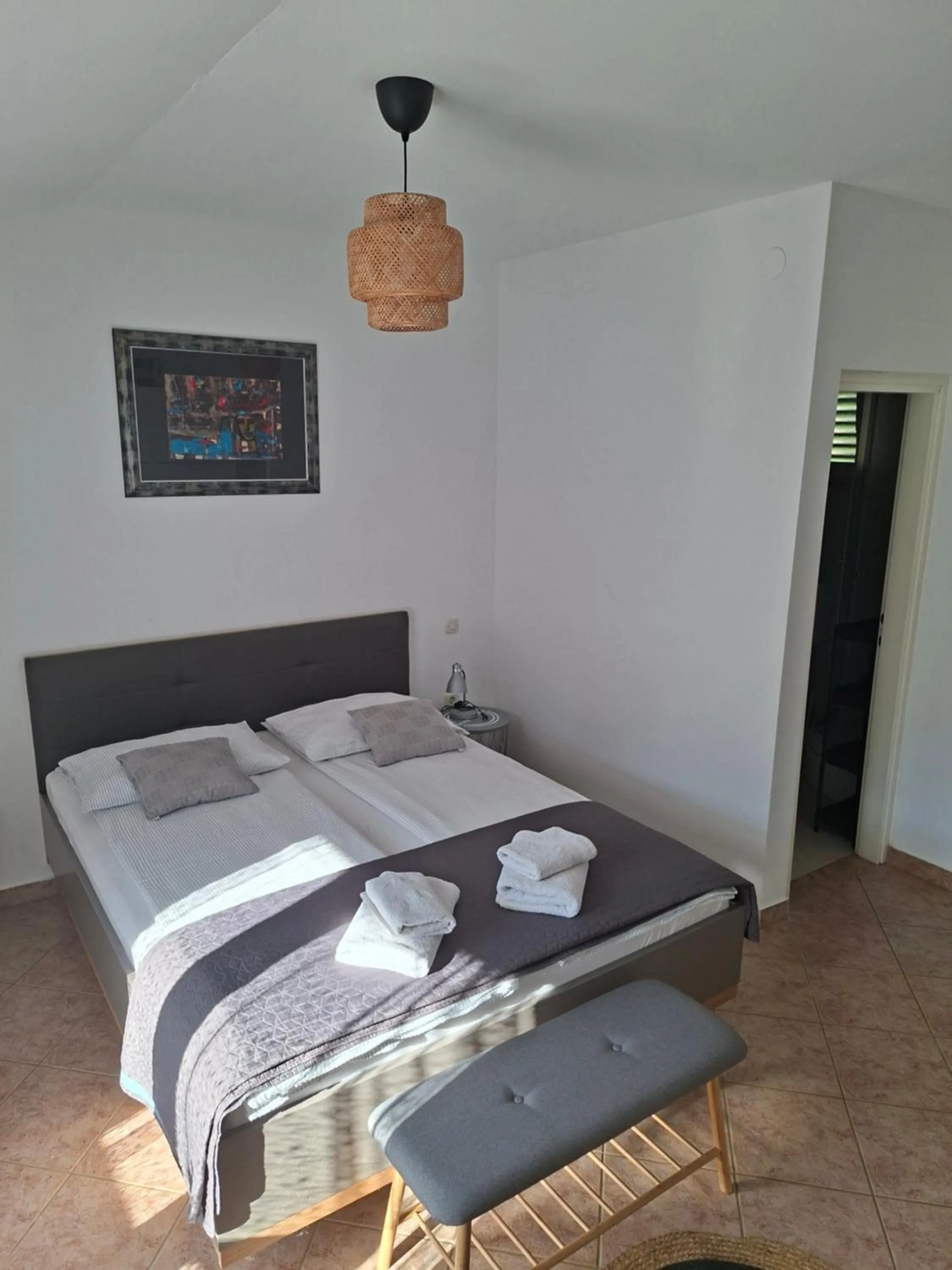 Bed in Martina Guest house-Rooms