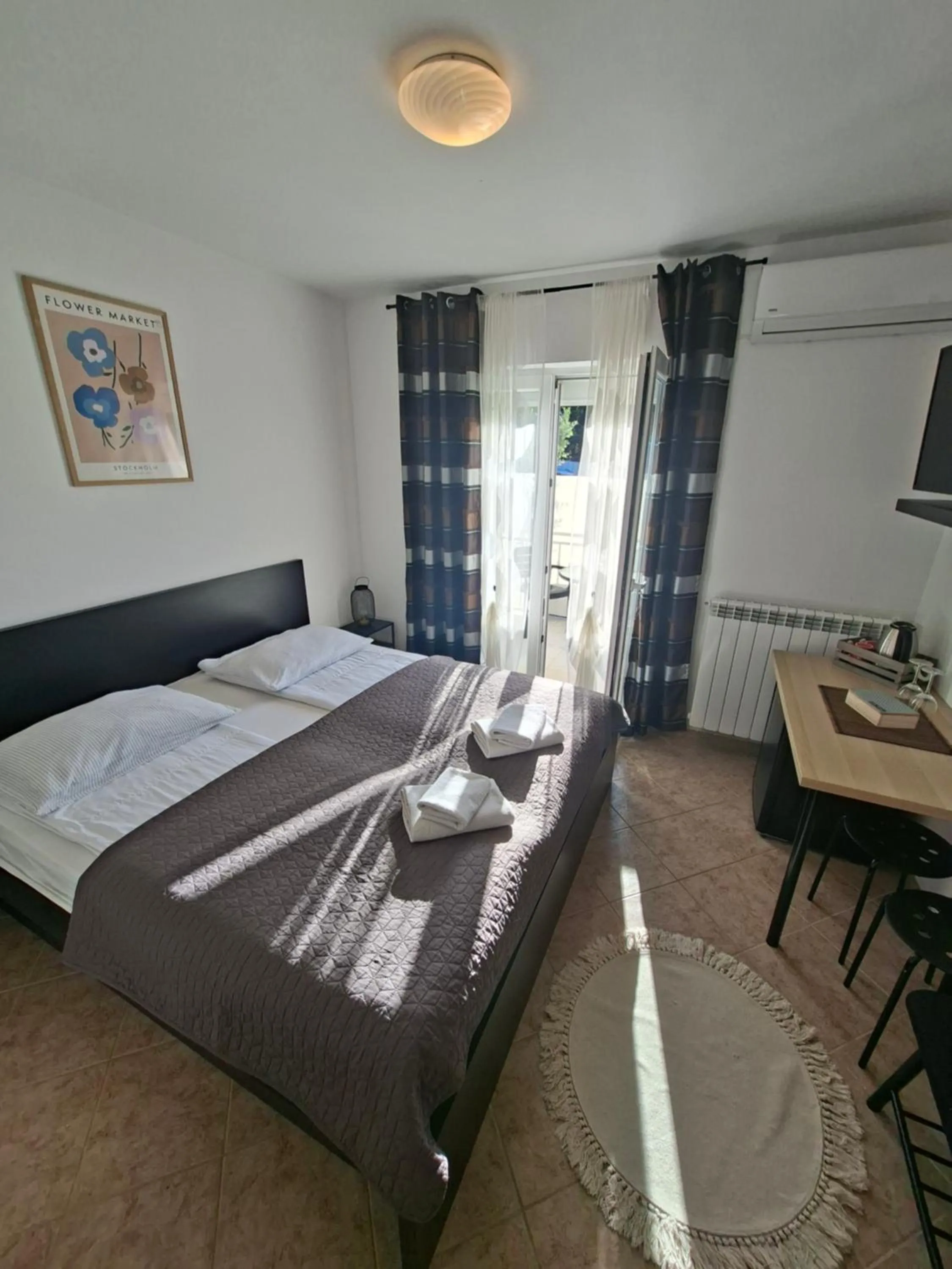 Bed in Martina Guest house-Rooms