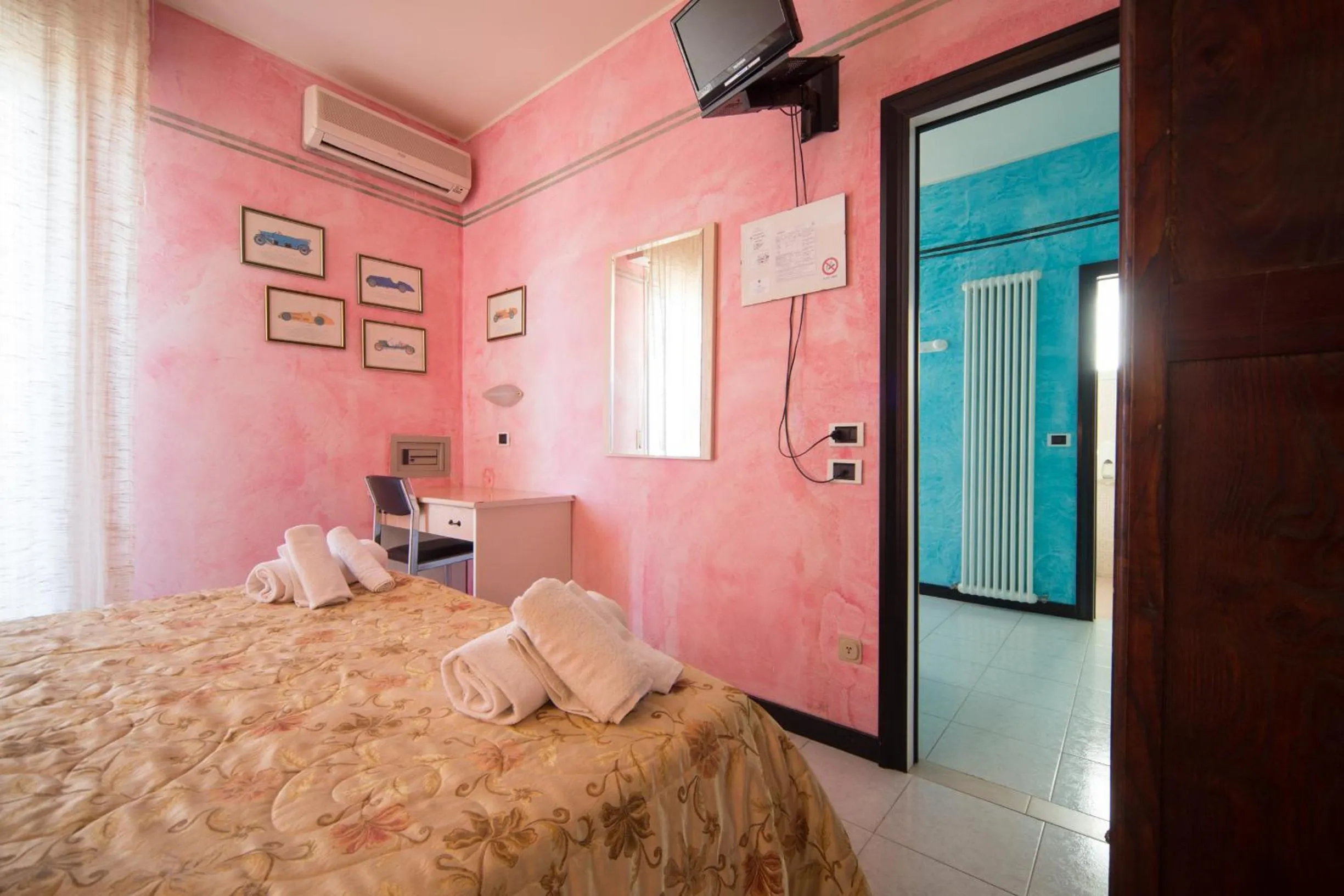 Bedroom in Amba Hotel