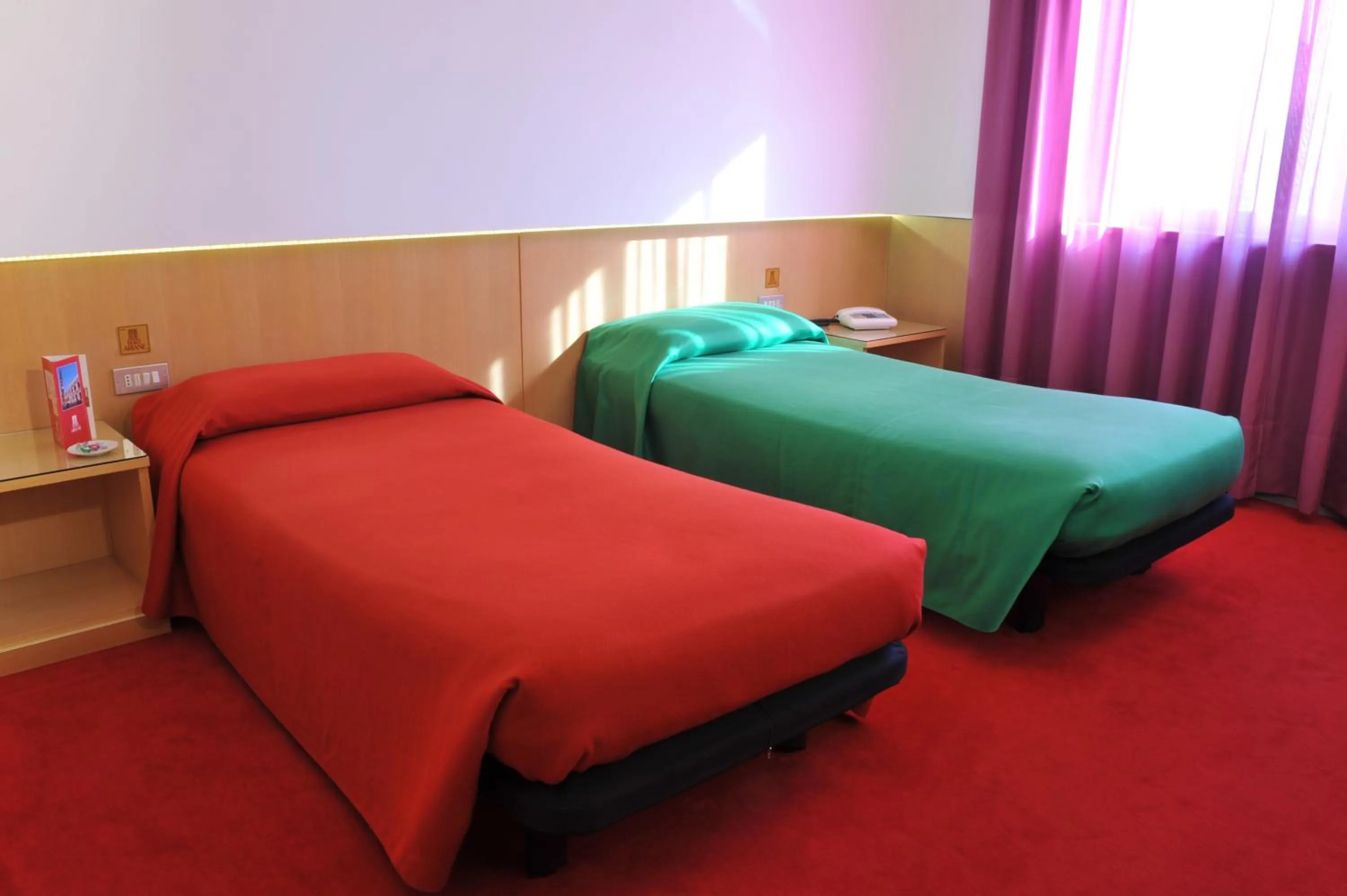 Bed in Hotel Ariane