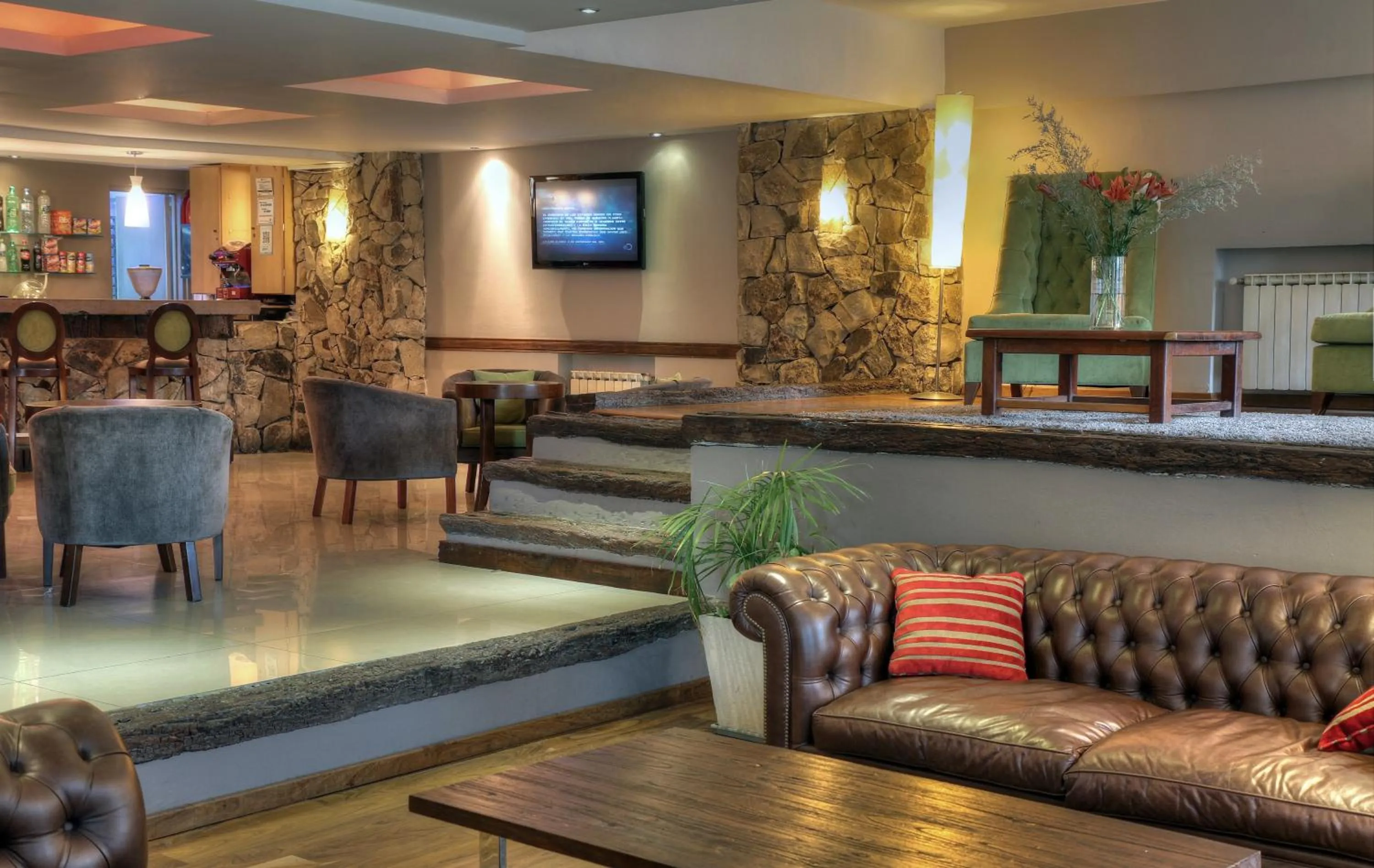 Communal lounge/ TV room in Hotel Alt Interlaken