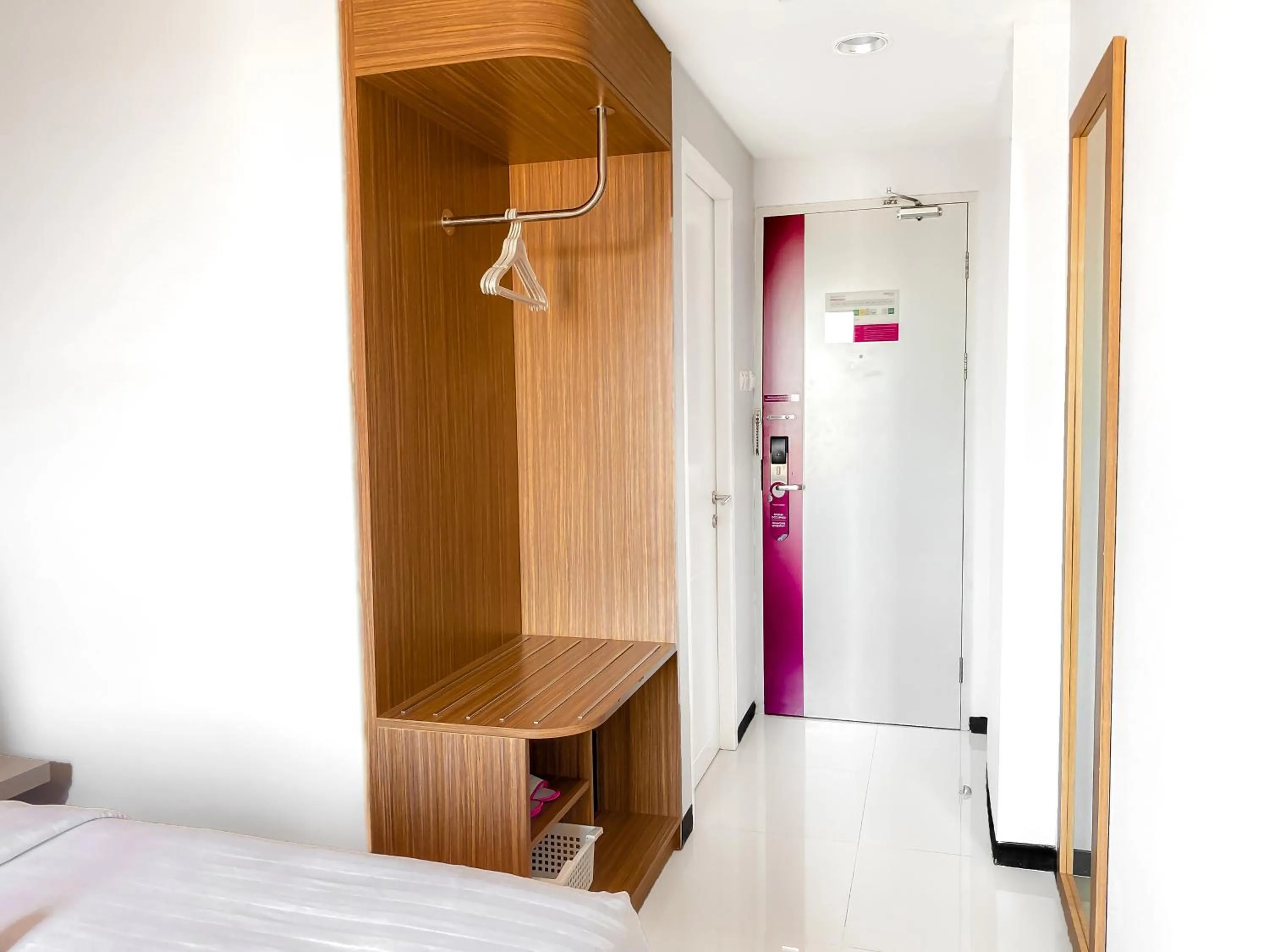 wardrobe, Bed in favehotel Rungkut Surabaya