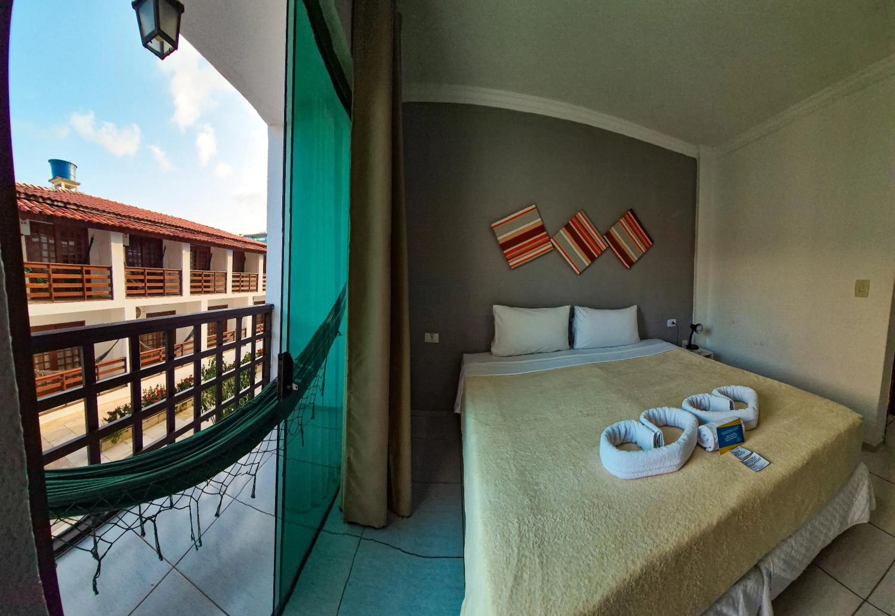 Bedroom, Bed in Estação do Sol Praia Hotel