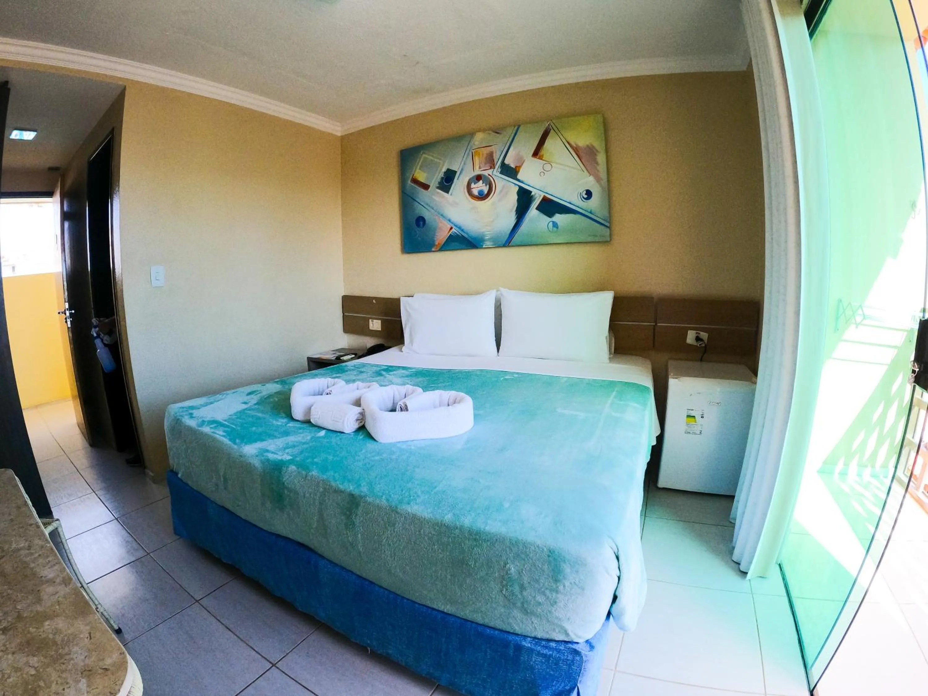 Photo of the whole room, Bed in Estação do Sol Praia Hotel