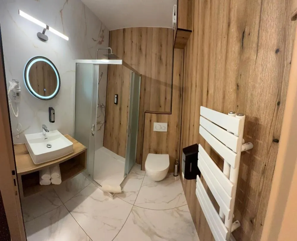 Bathroom in Hotel Adler