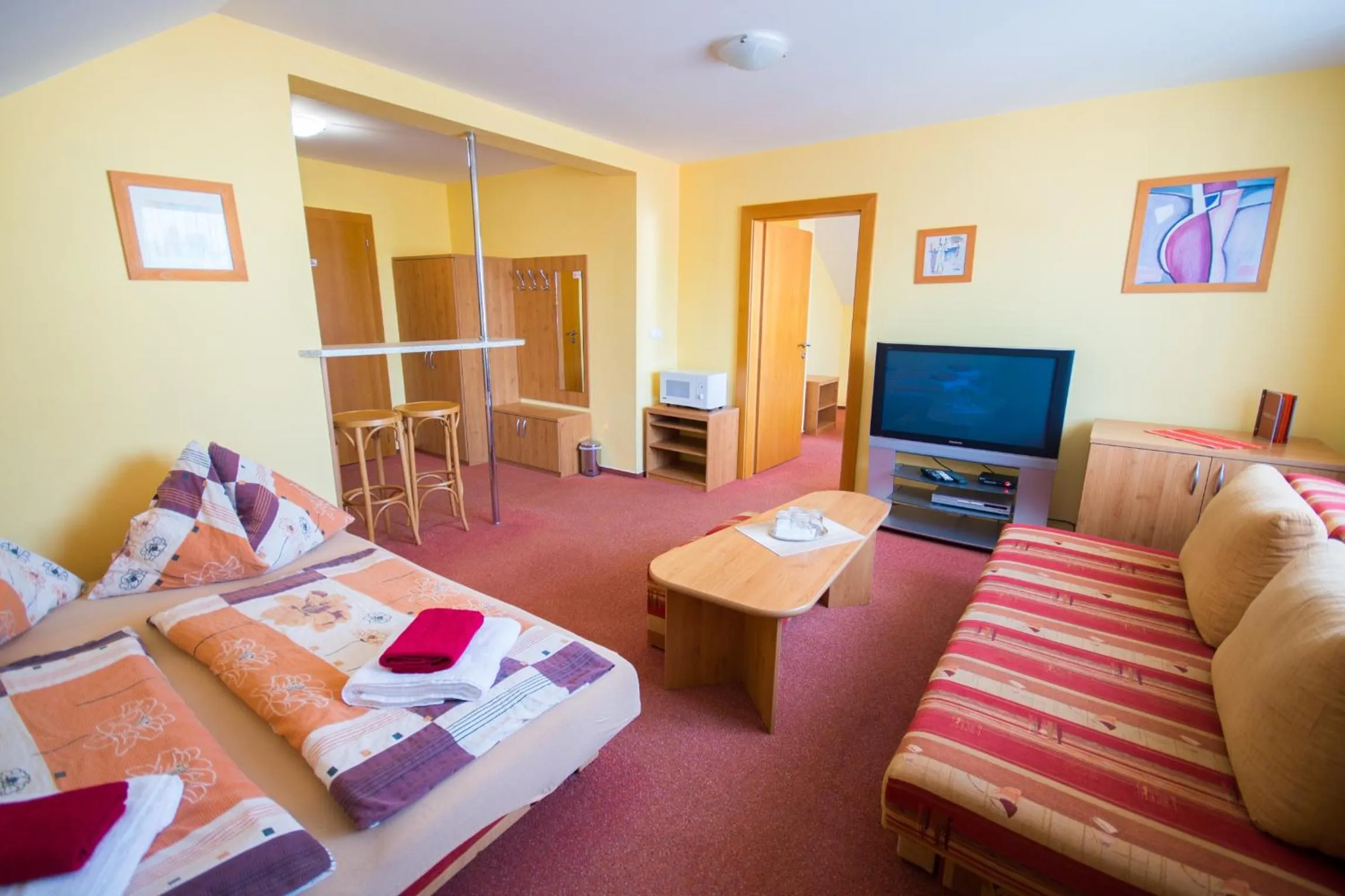 Living room, Bed in Penzion Ajda