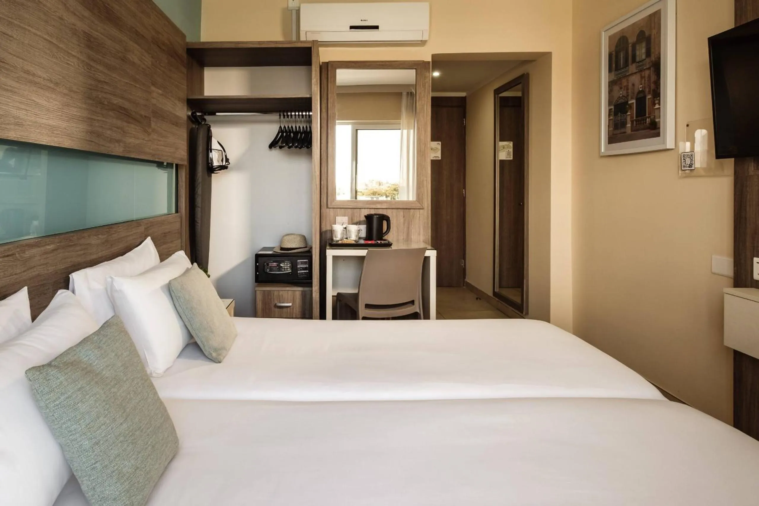 Bedroom, Bed in 115 The Strand Hotel by NEU Collective