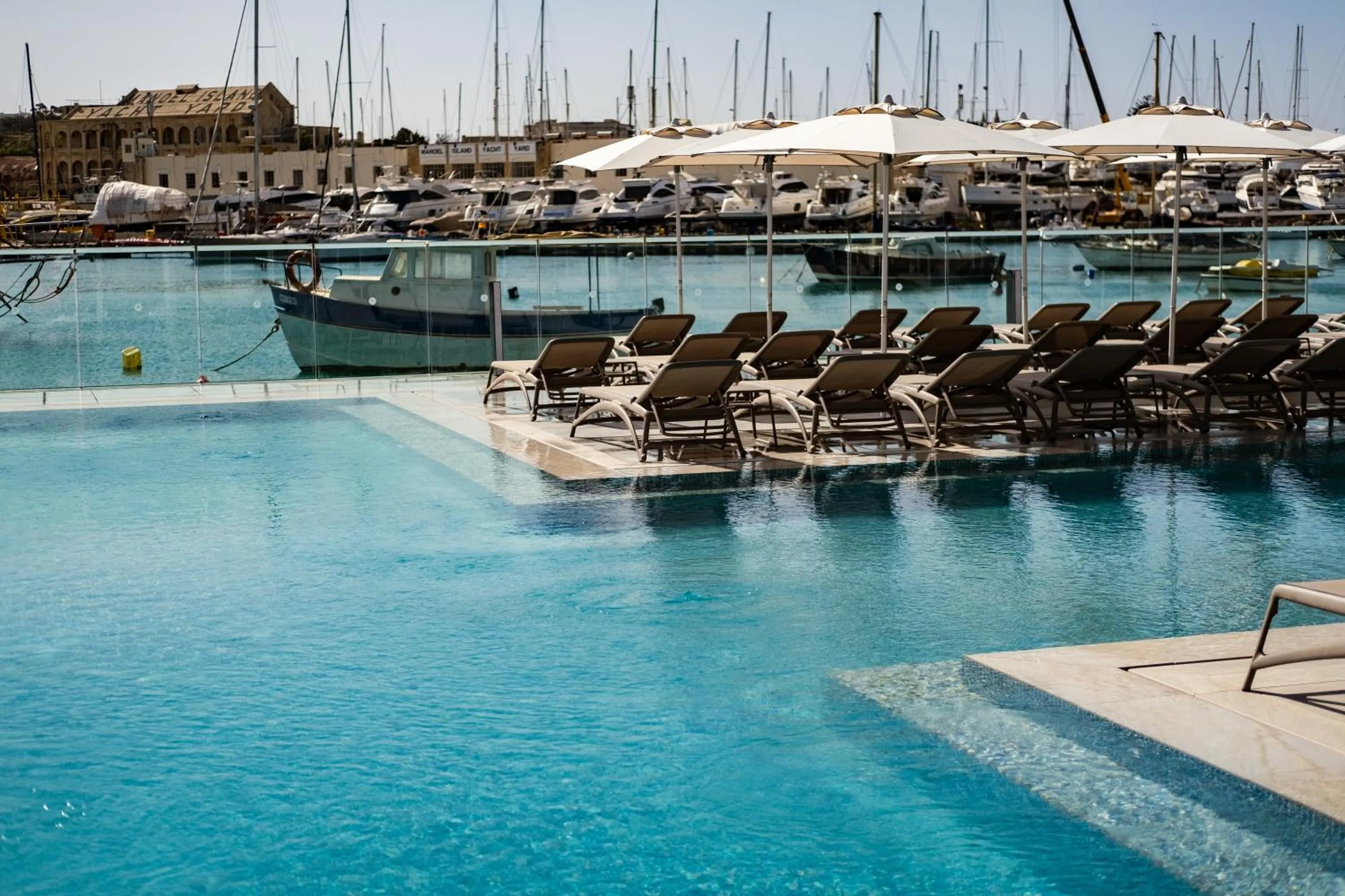 Swimming pool in 115 The Strand Hotel by NEU Collective