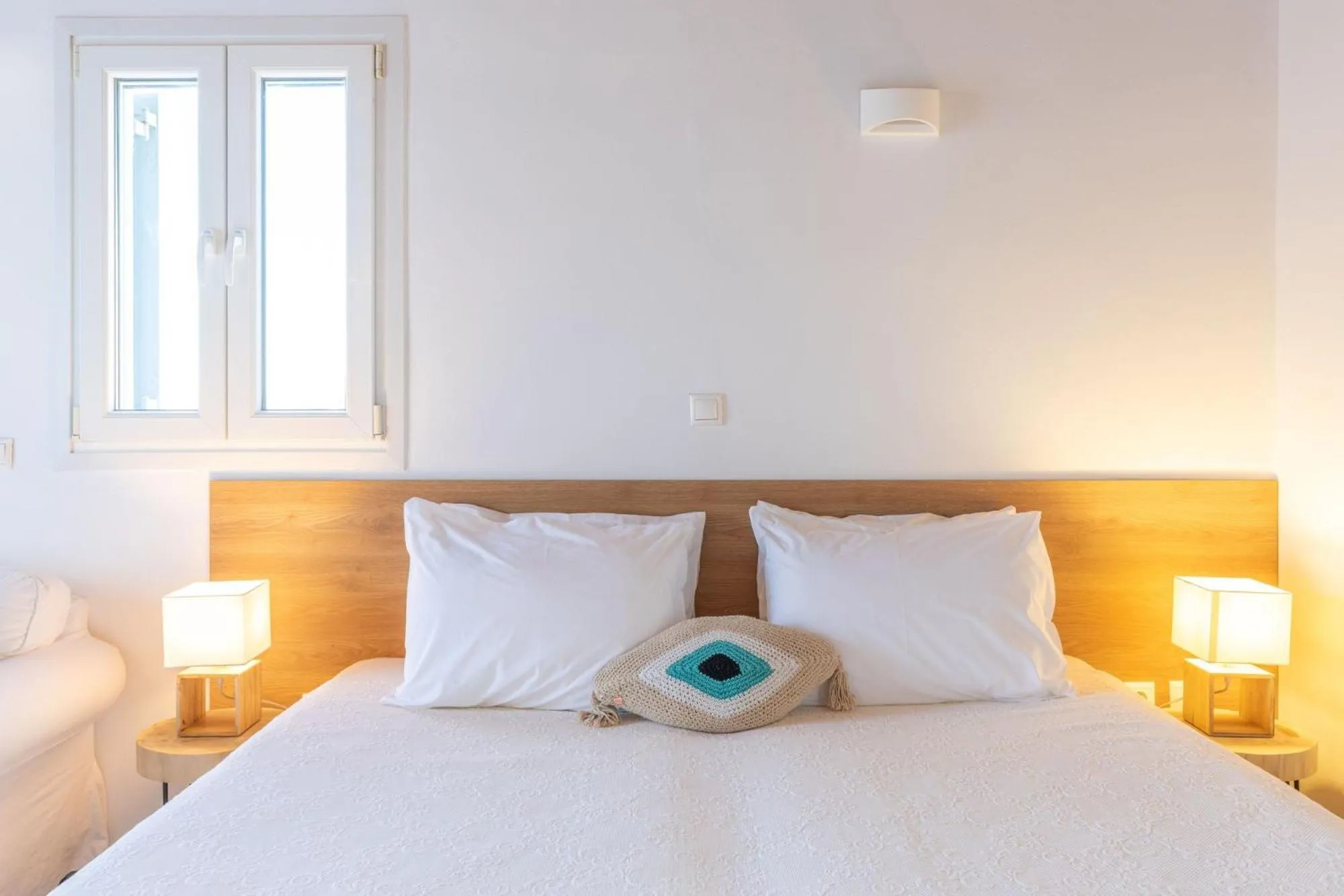 Bed in Sea Wind Villas and Suites