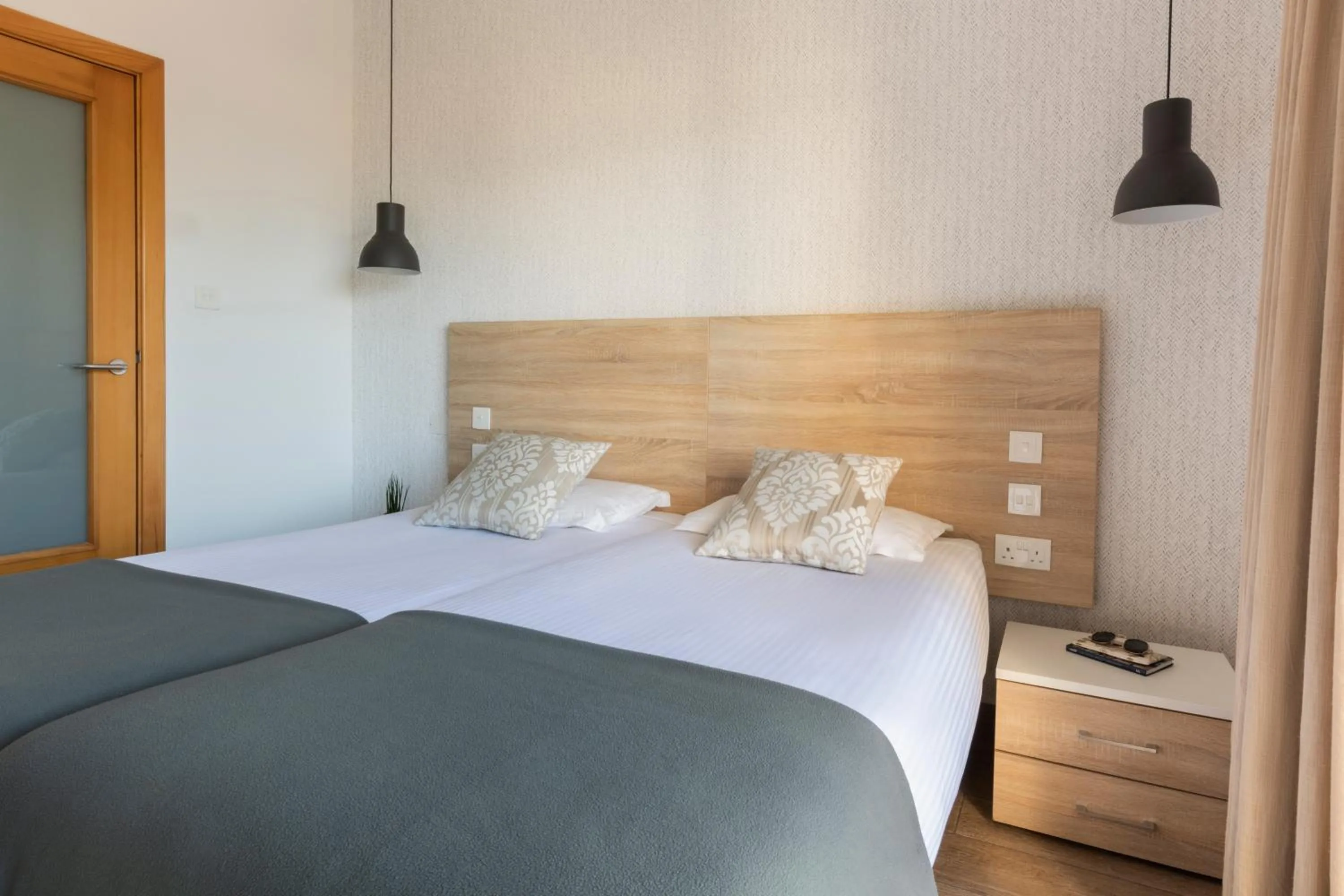 Bedroom, Bed in Plaza Regency Hotels