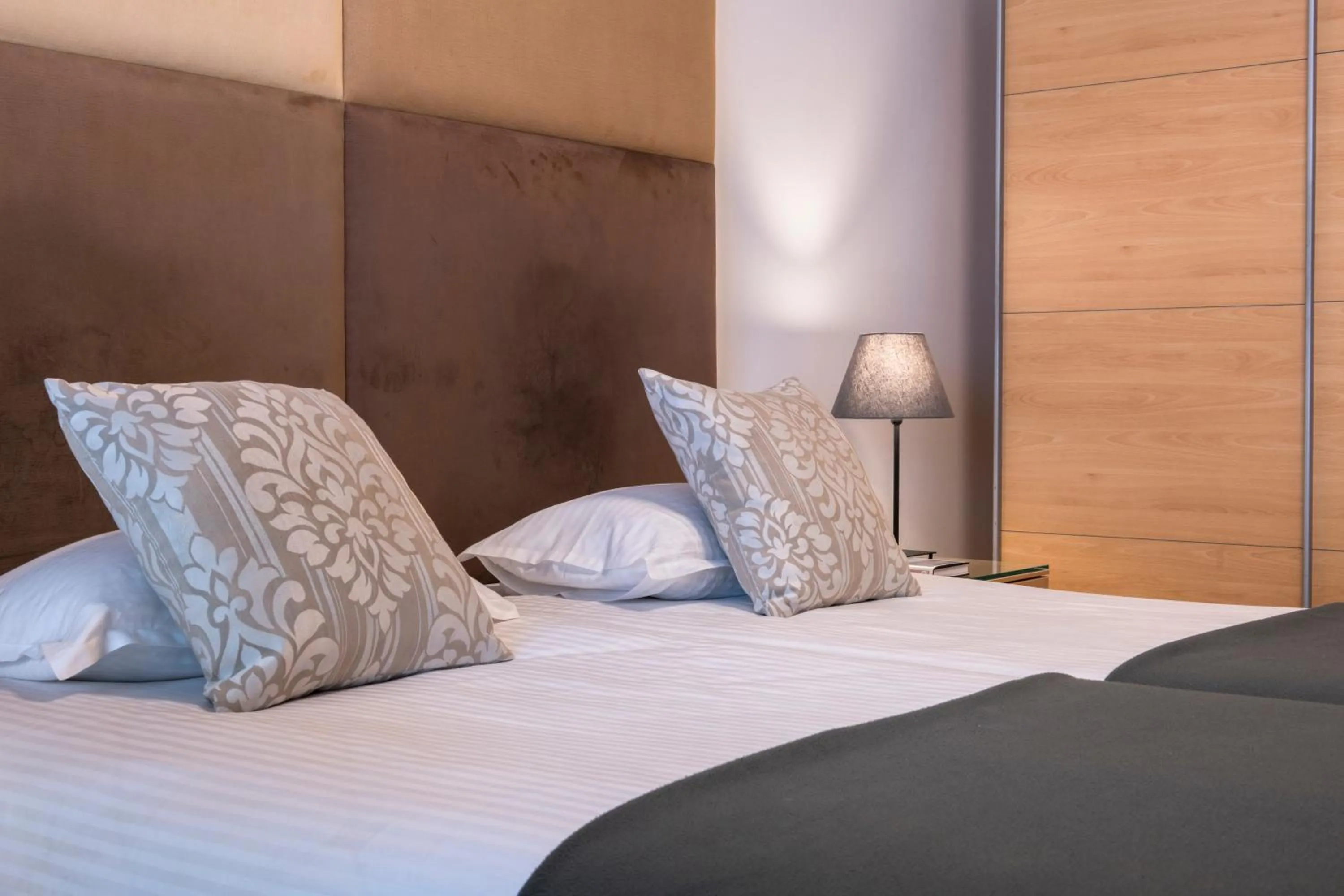 Bed in Plaza Regency Hotels