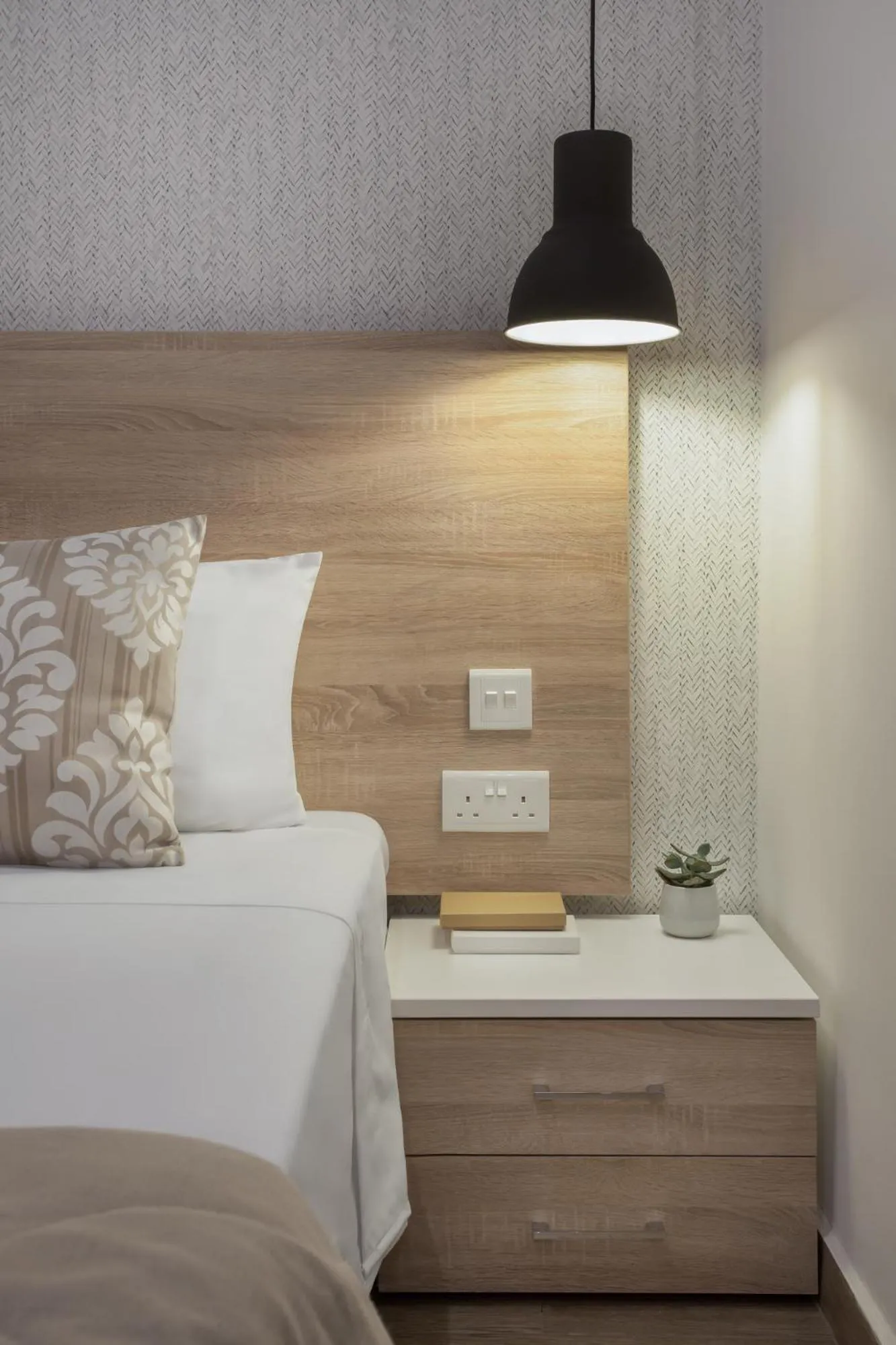 Bed in Plaza Regency Hotels