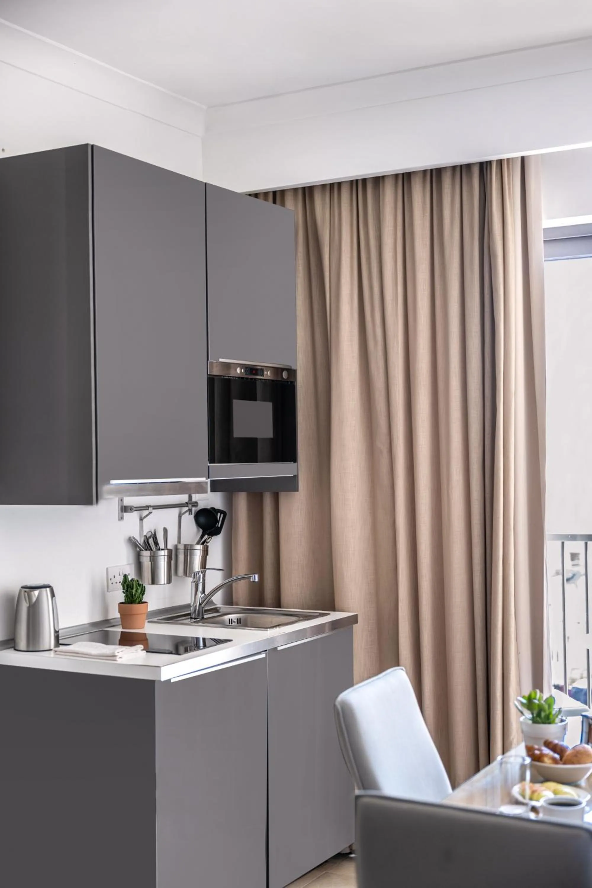 Kitchen or kitchenette in Plaza Regency Hotels