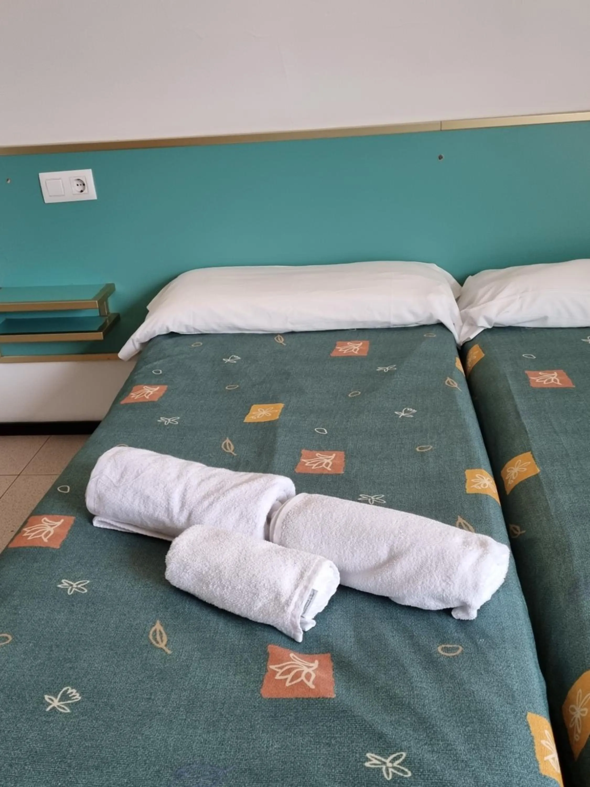 Property building, Bed in Apartments Lloret Sun