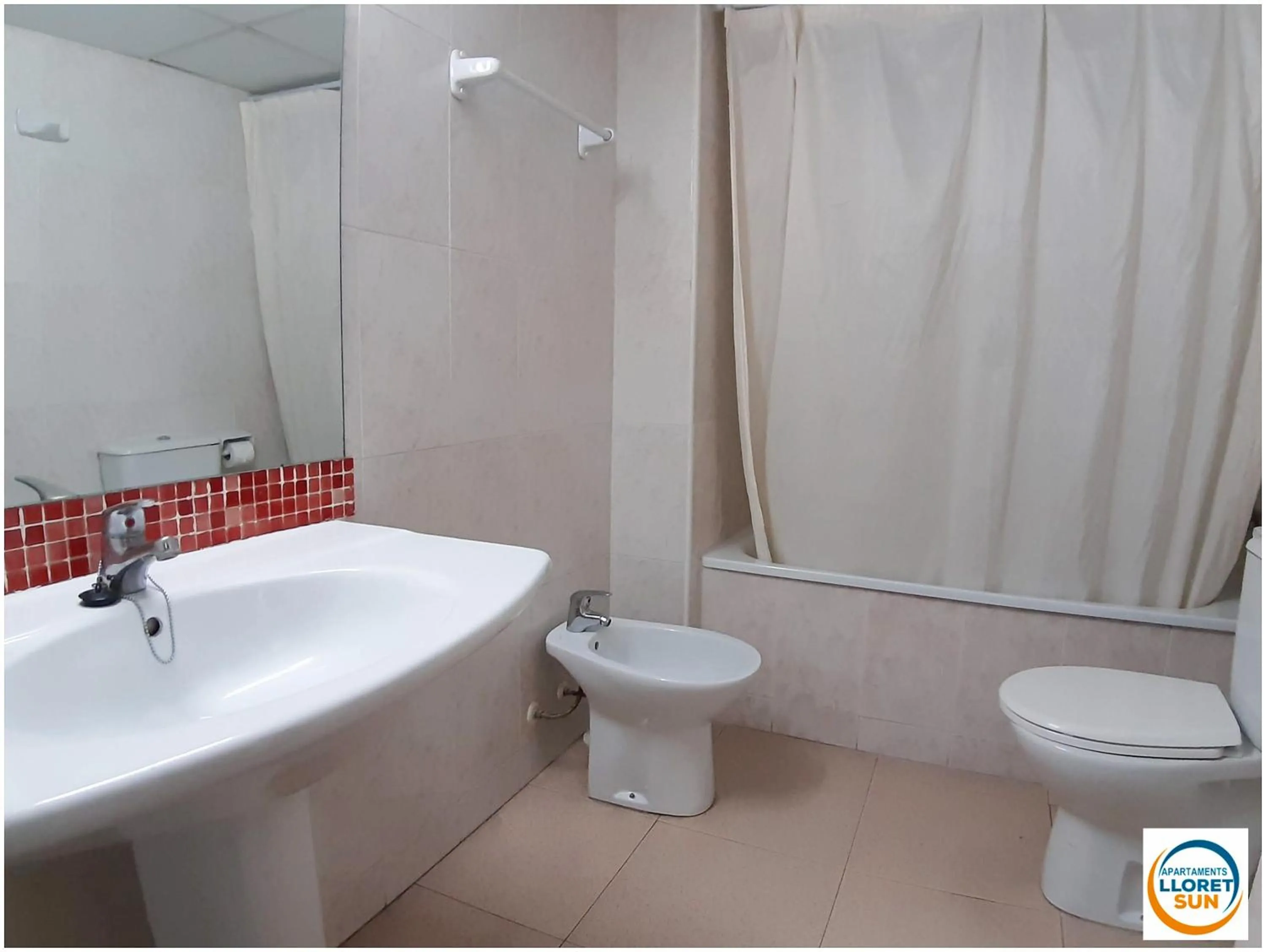 Bathroom in Apartments Lloret Sun