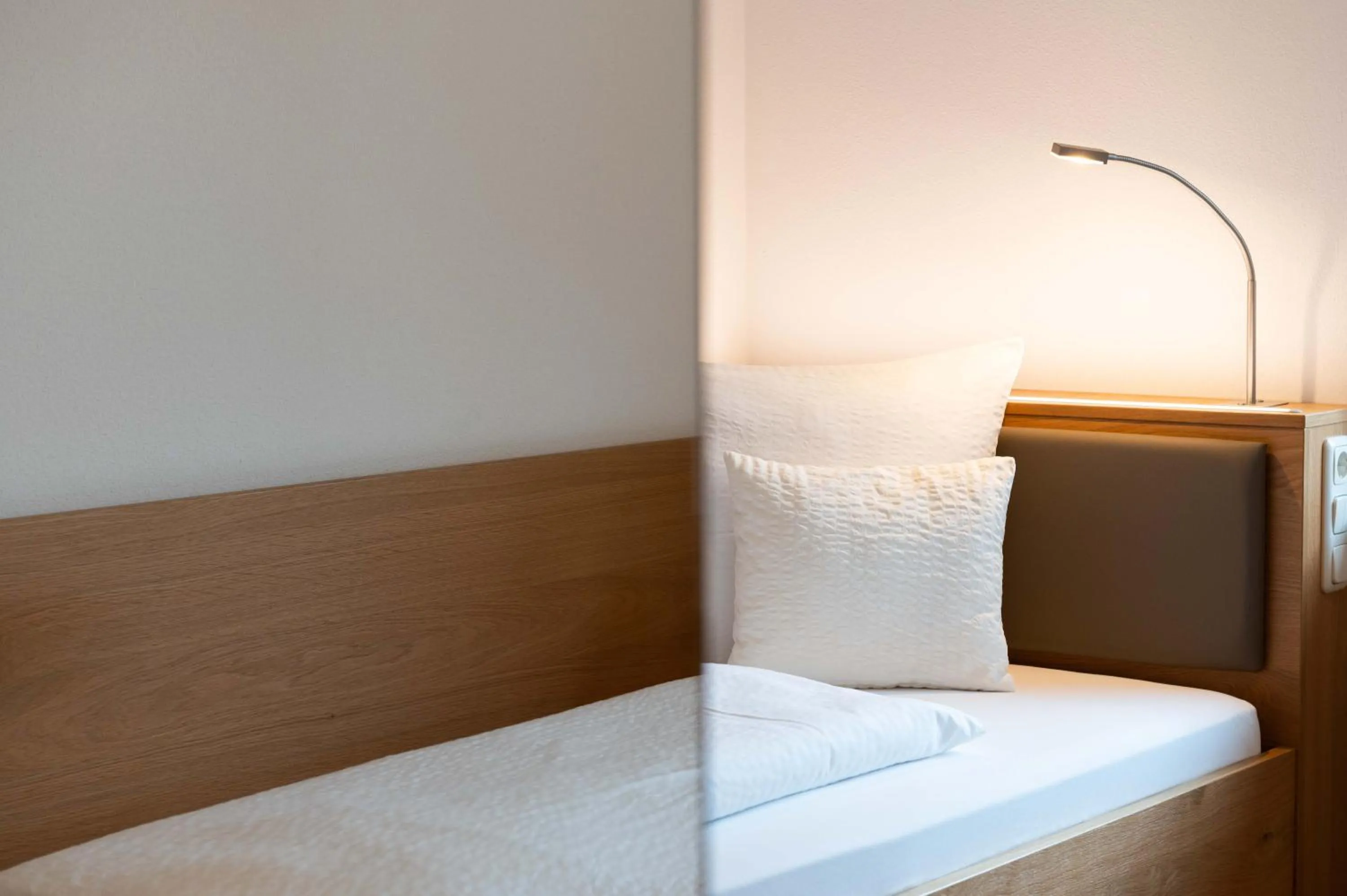 Bed in Hotel Gasthof Rosenwirt