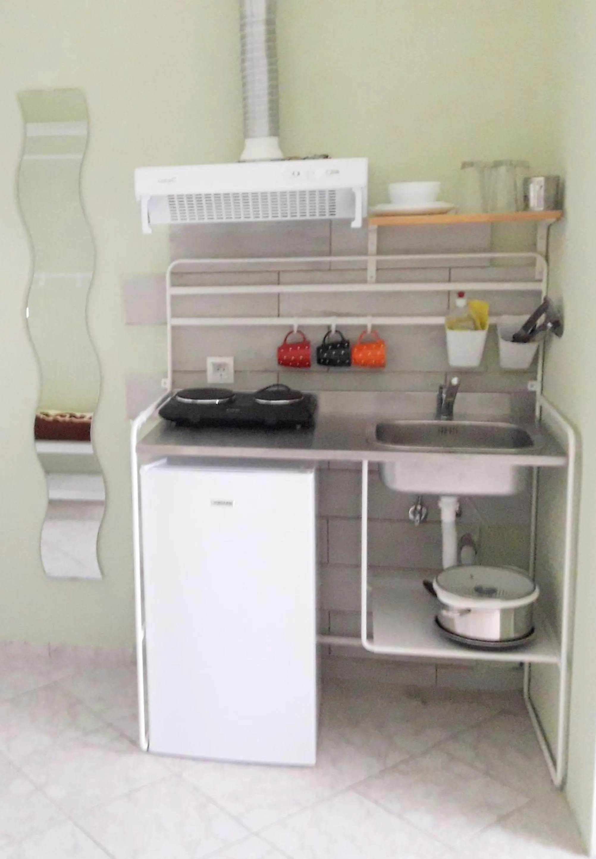 Kitchen or kitchenette in Artemis Studios & Apartments