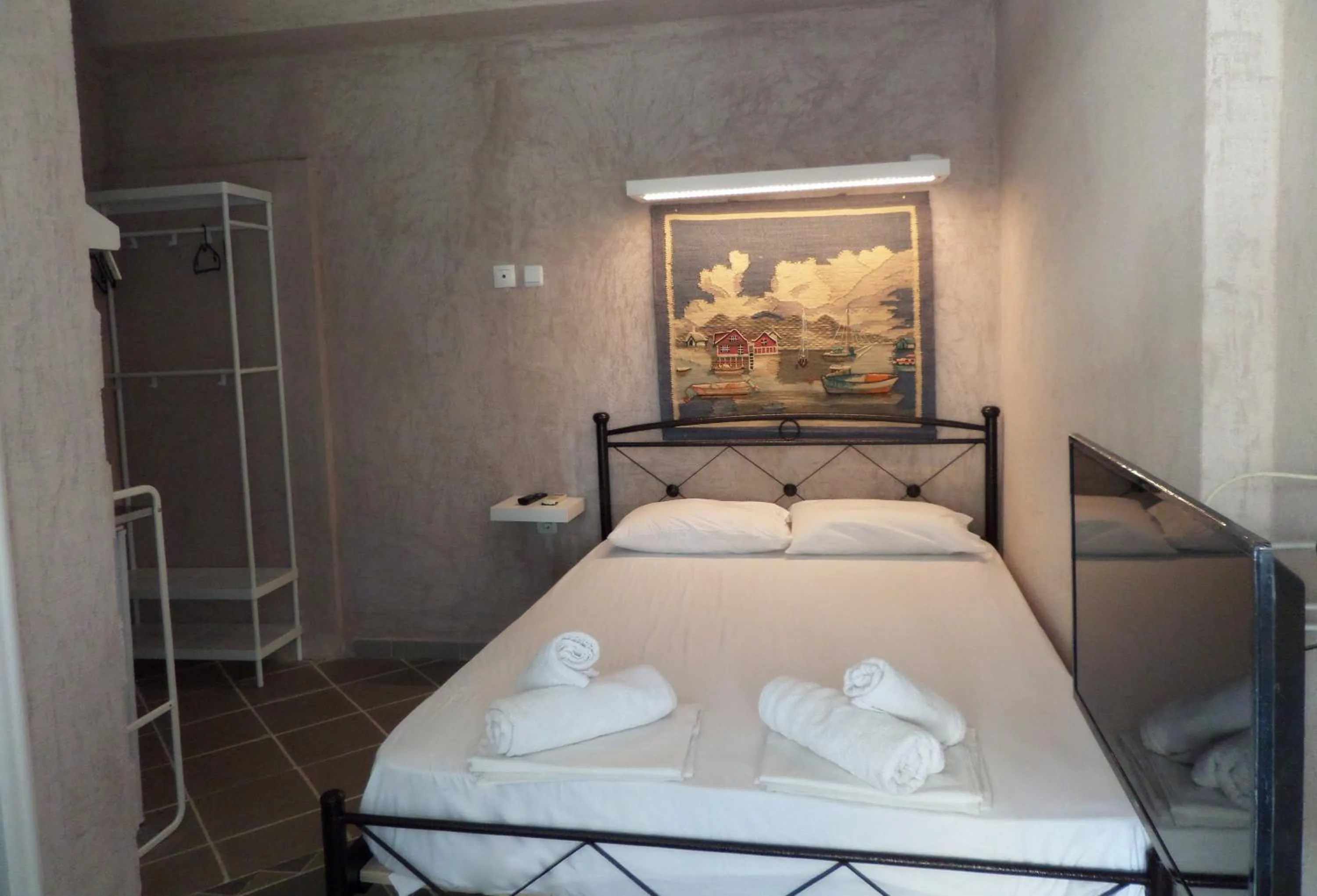 Bed in Artemis Studios & Apartments