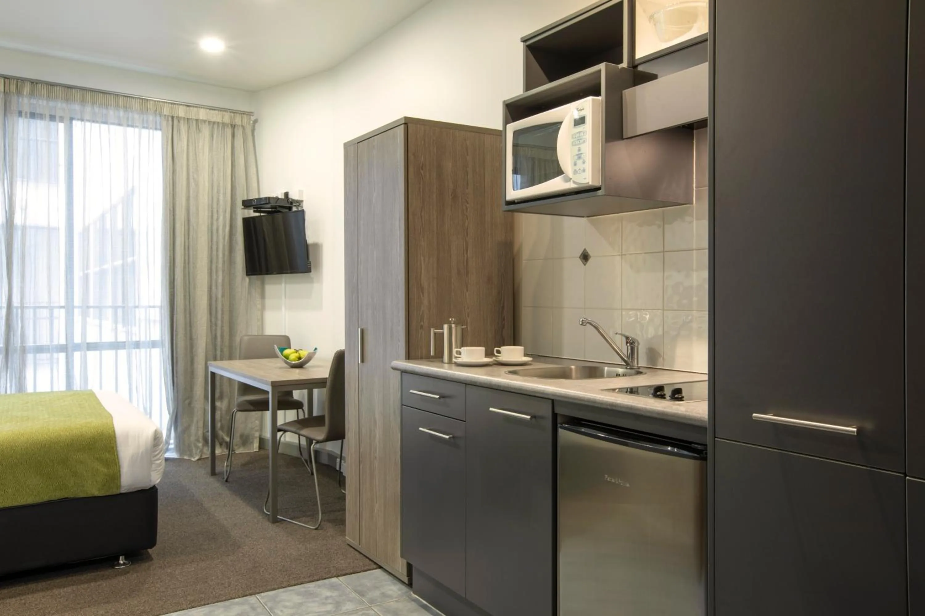Kitchen or kitchenette in Quest Atrium Apartment Hotel