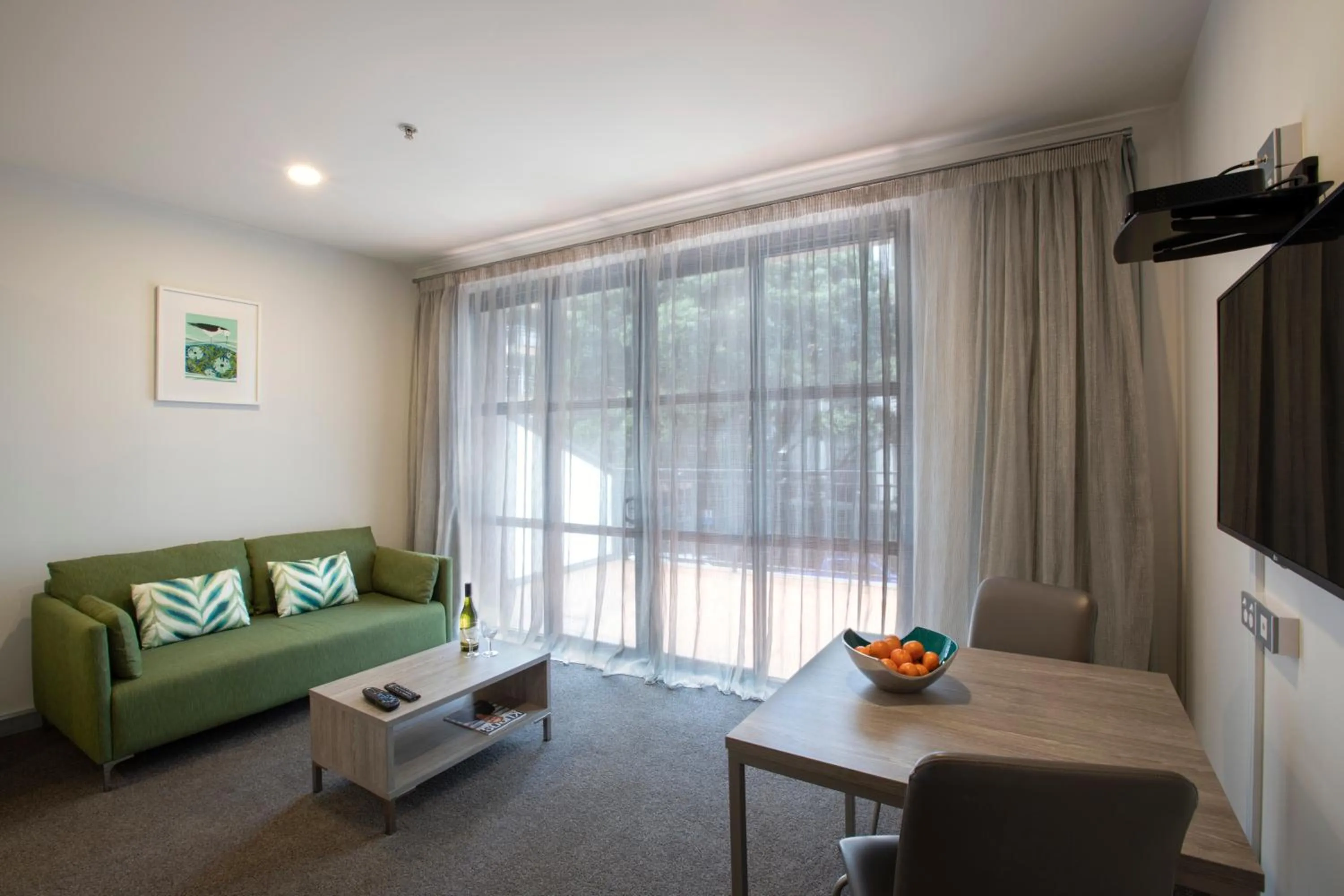 Living room in Quest Atrium Apartment Hotel