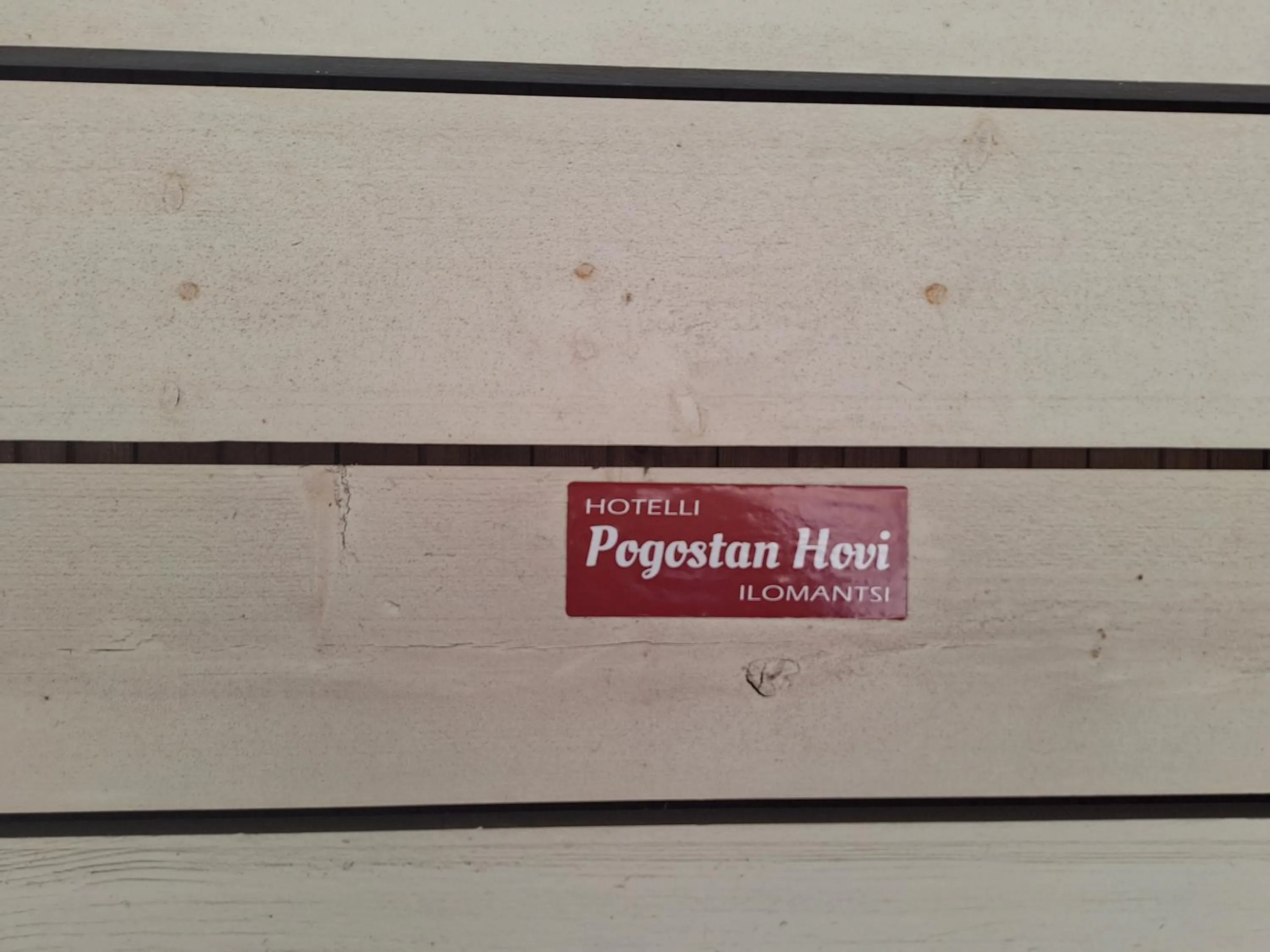 Property logo or sign in Hotelli Pogostan Hovi