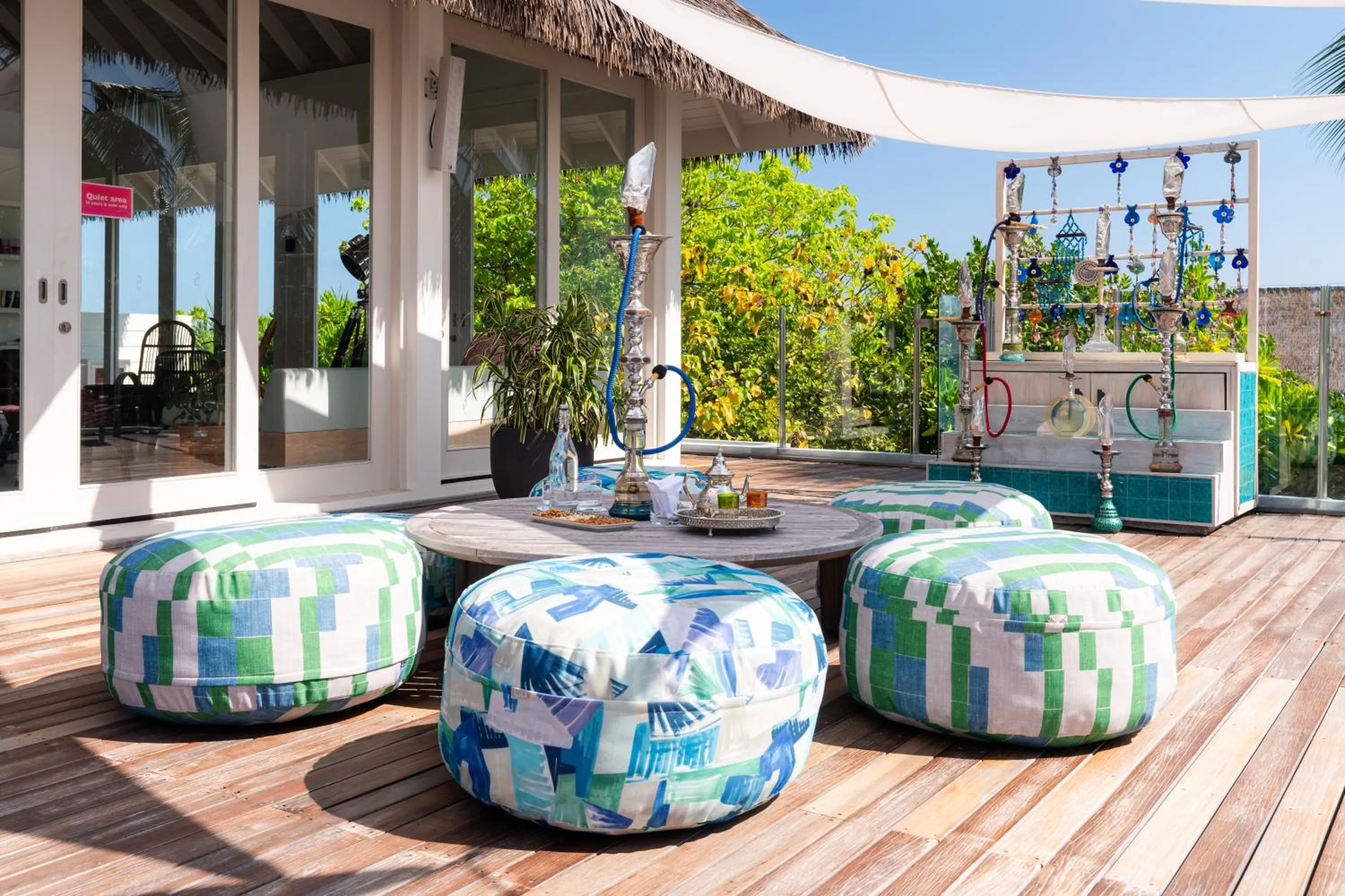 Lounge or bar in Finolhu, A Seaside Collection Resort, a Member of Design Hotels