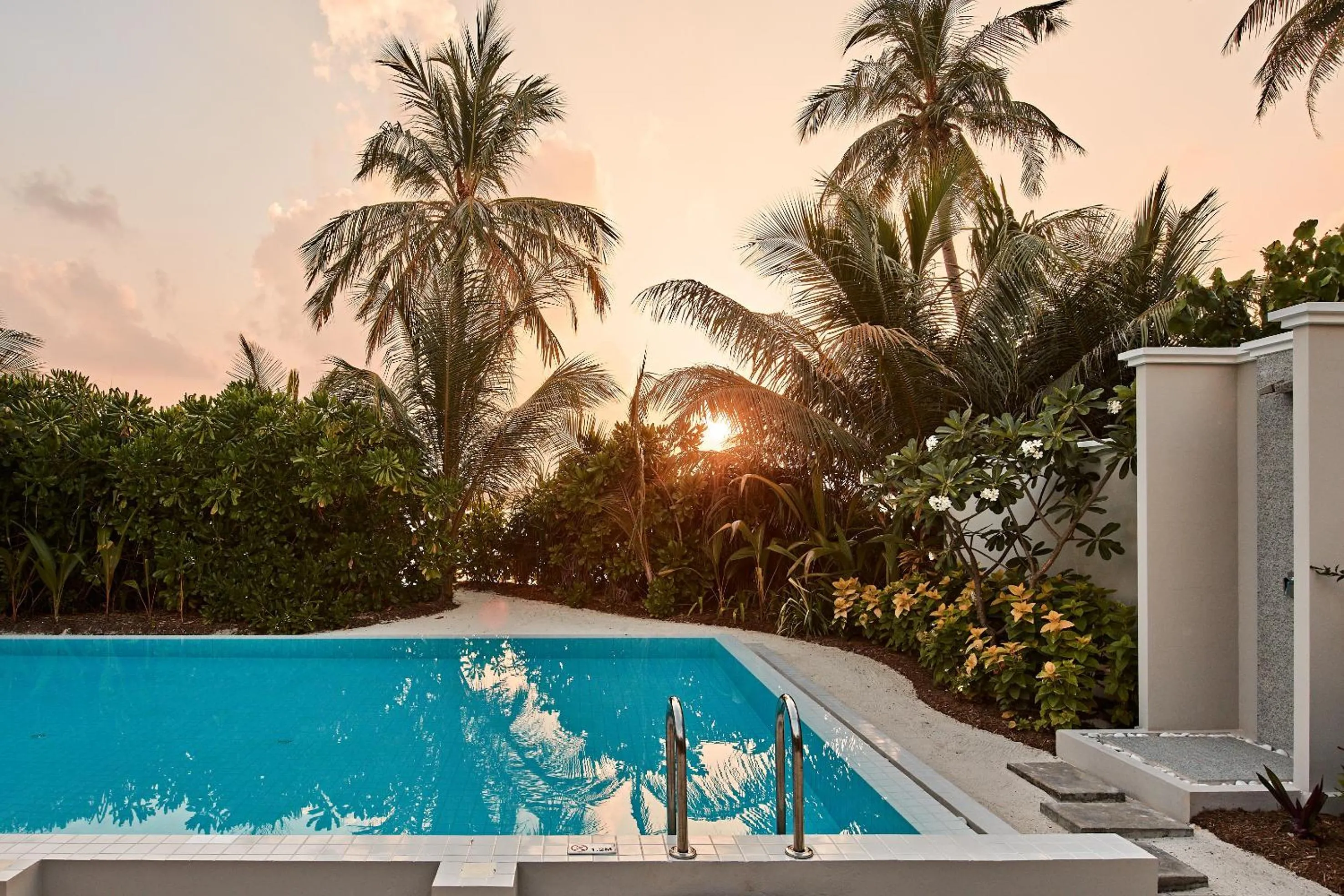 Swimming pool in Finolhu, A Seaside Collection Resort, a Member of Design Hotels