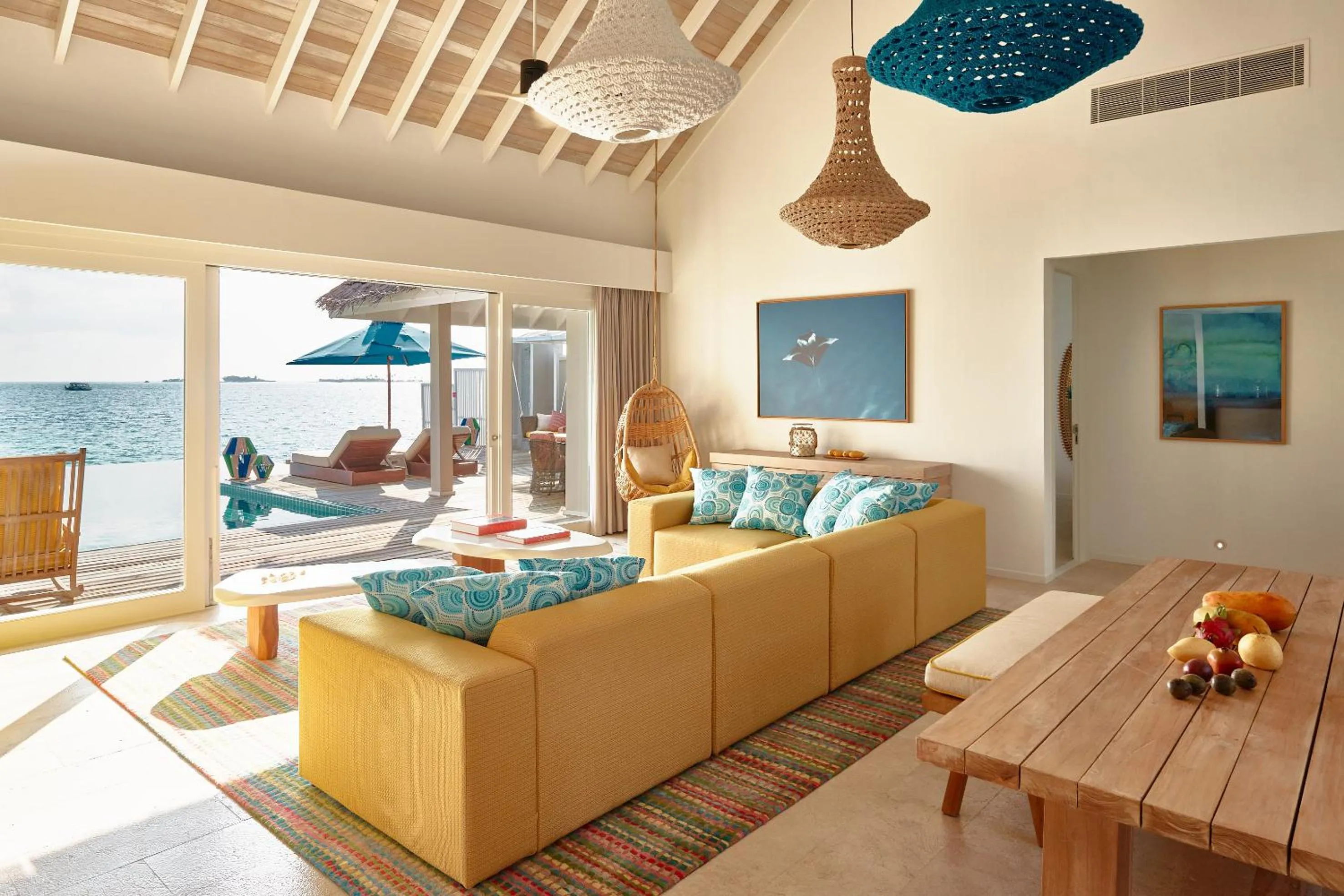 Living room in Finolhu, A Seaside Collection Resort, a Member of Design Hotels