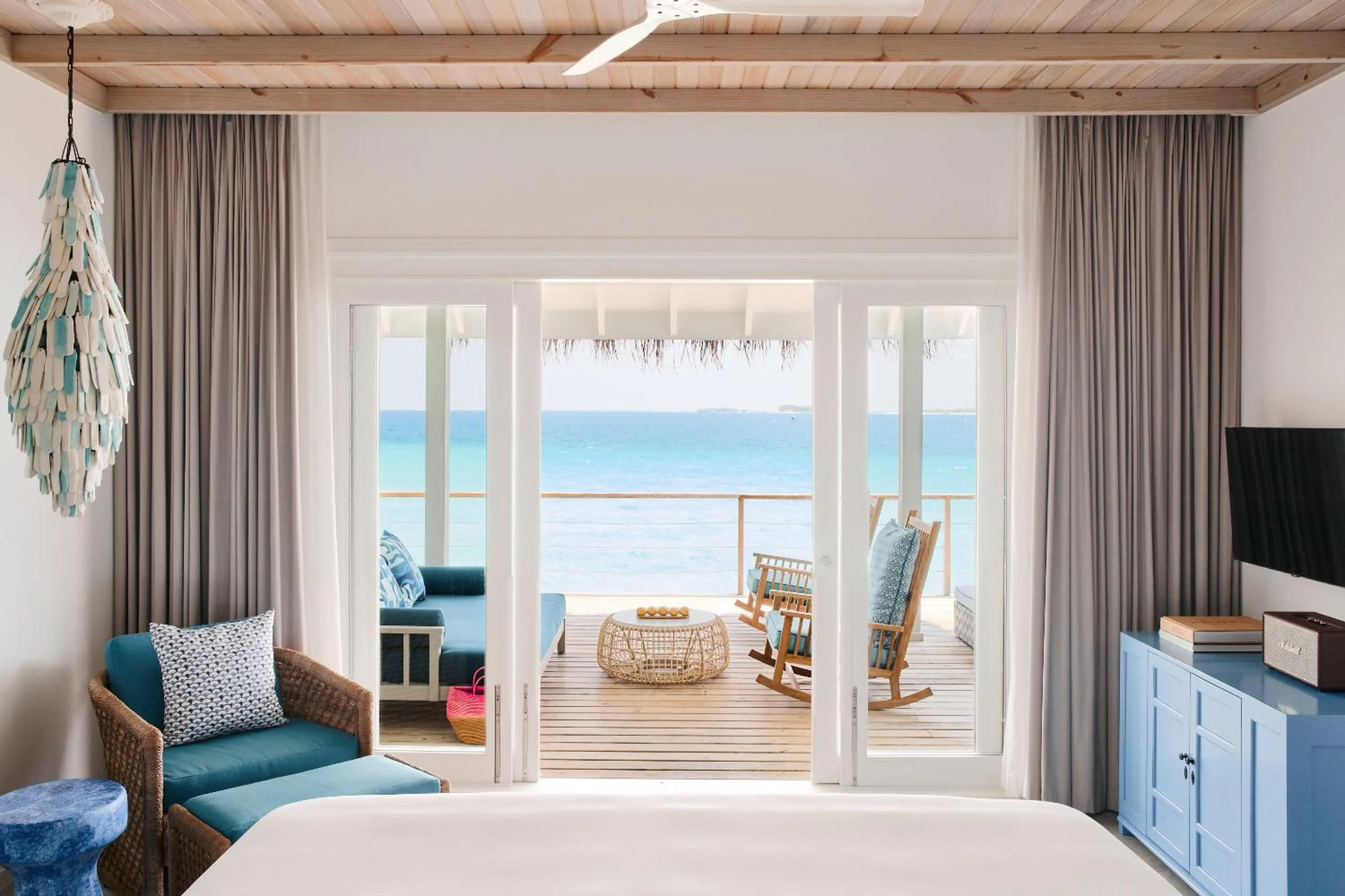 Seating area, Bed in Finolhu, A Seaside Collection Resort, a Member of Design Hotels
