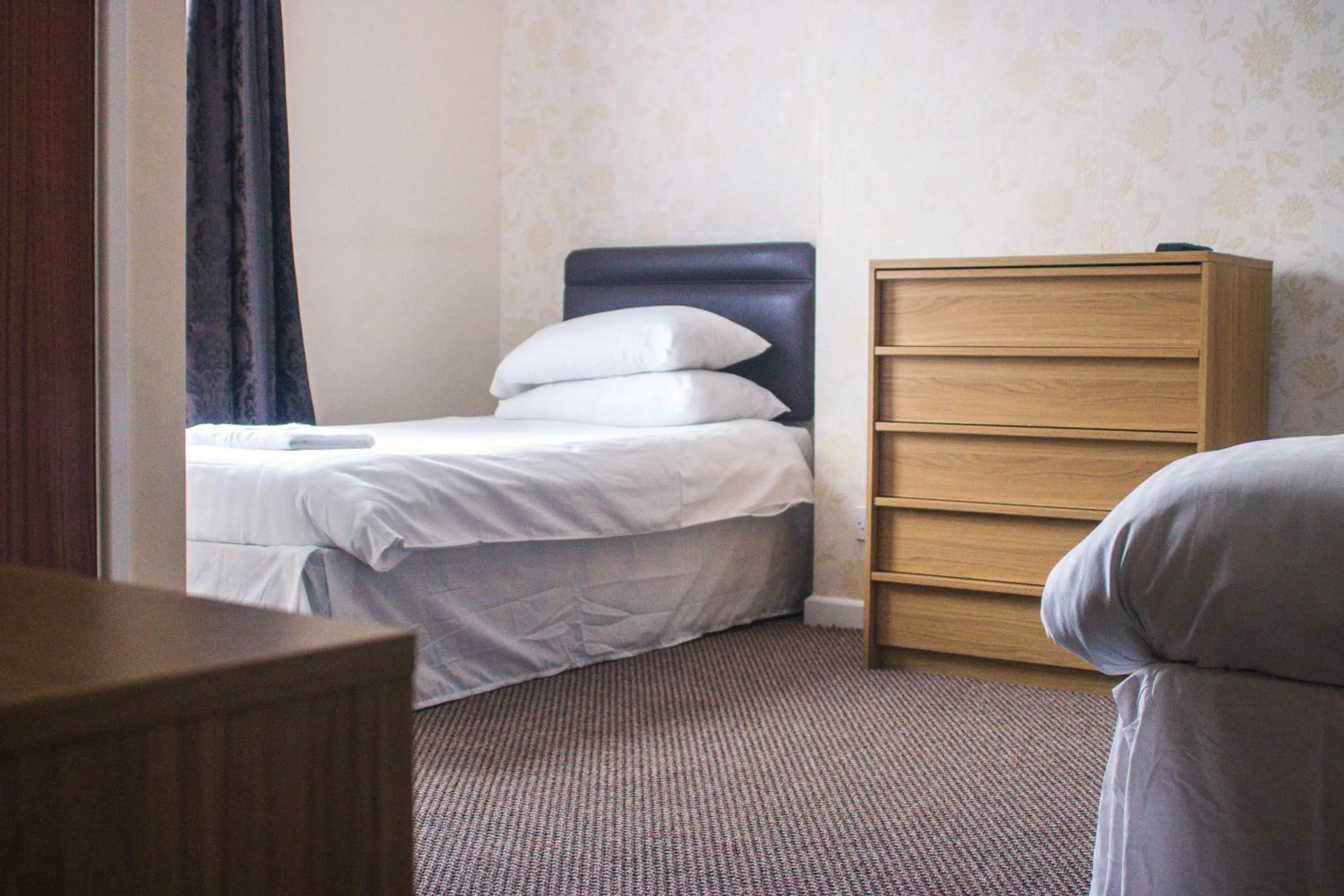 Bed in Wellesley Park Hotel