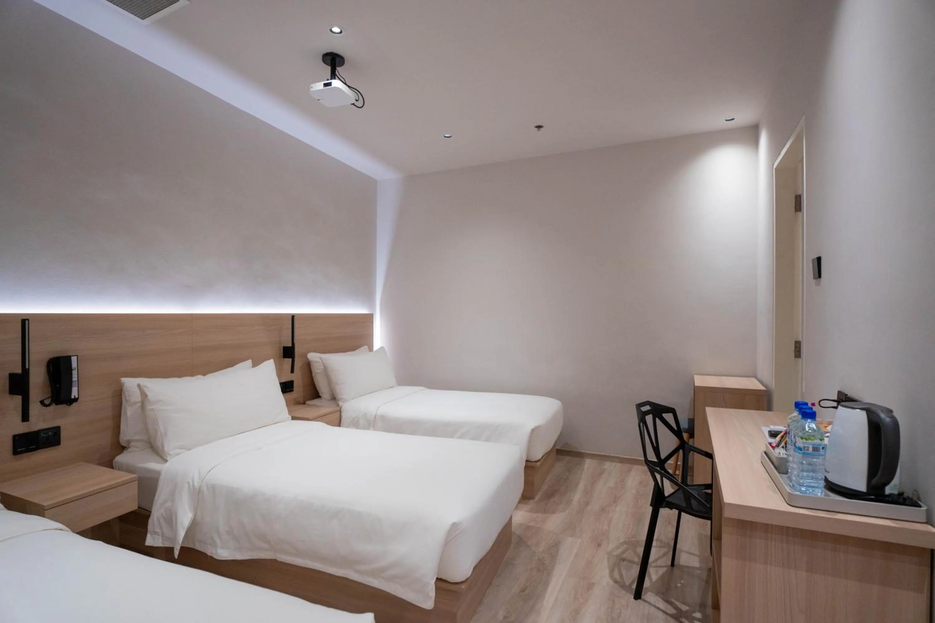 Bed in Rest Bugis Hotel