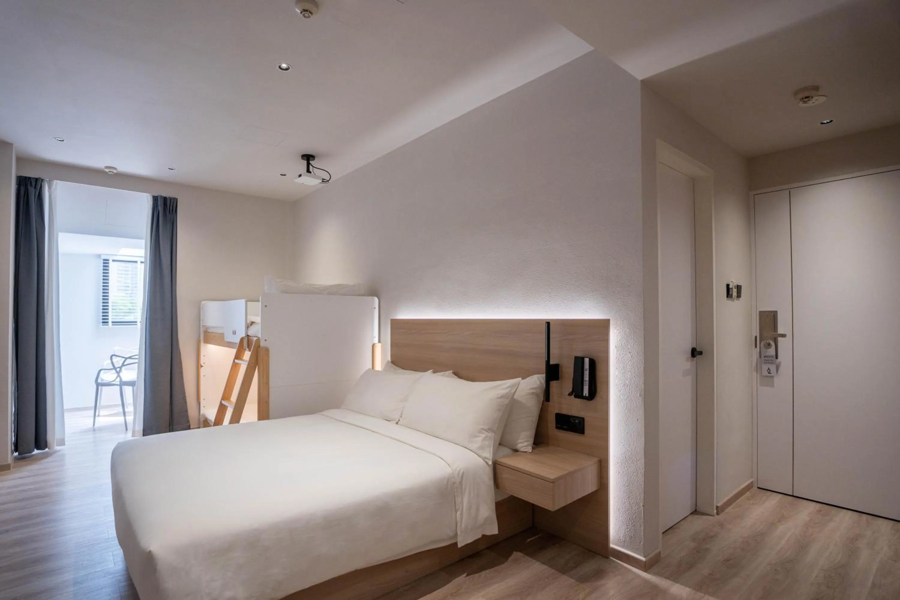 Bed in Rest Bugis Hotel